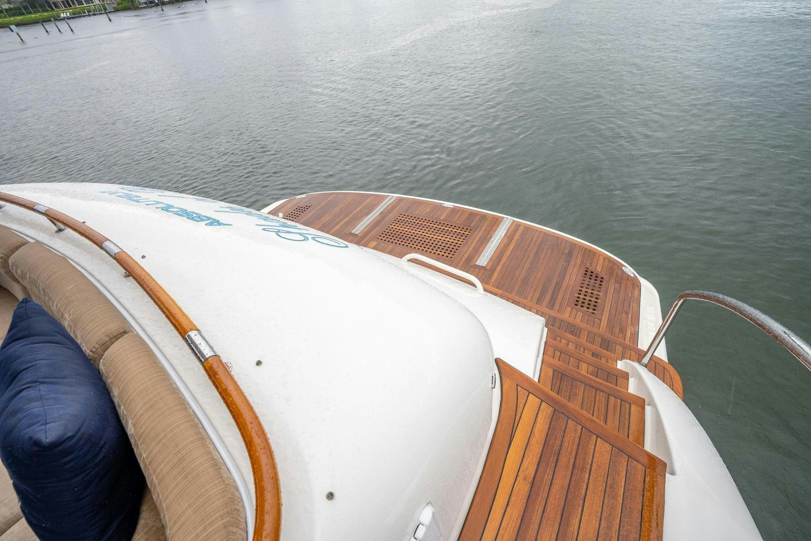a wooden boat with a wooden paddle aboard STARFIRE Yacht for Sale