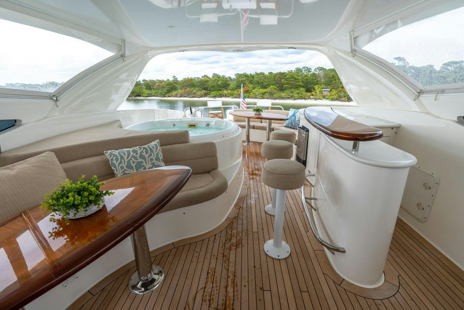 a room with a table and chairs aboard STARFIRE Yacht for Sale