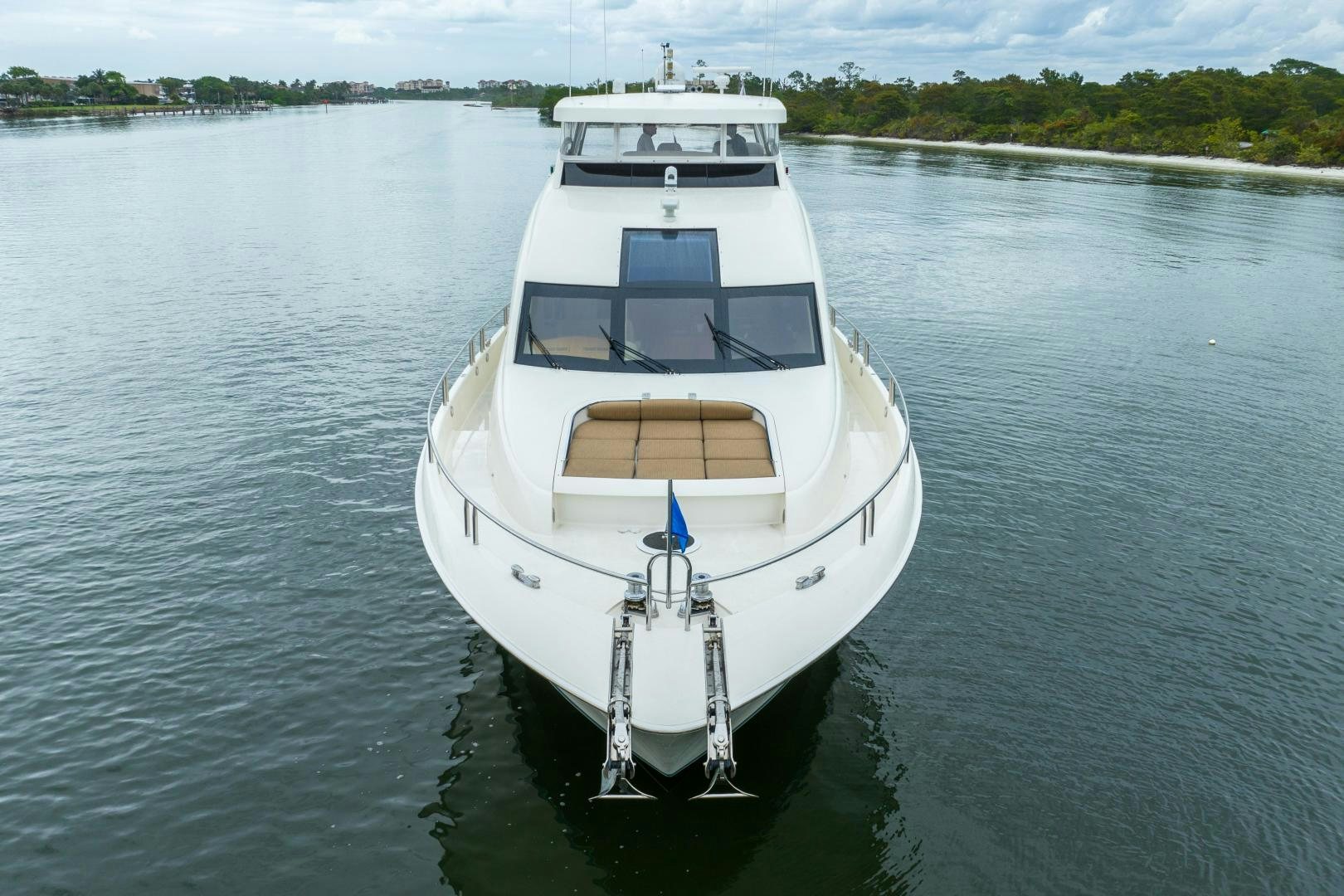 a white boat on the water aboard STARFIRE Yacht for Sale