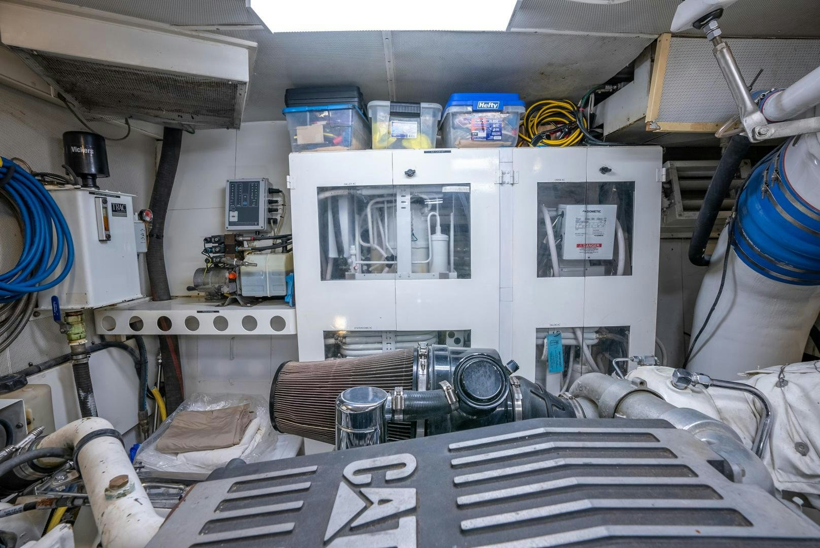 a person operating a machine aboard STARFIRE Yacht for Sale