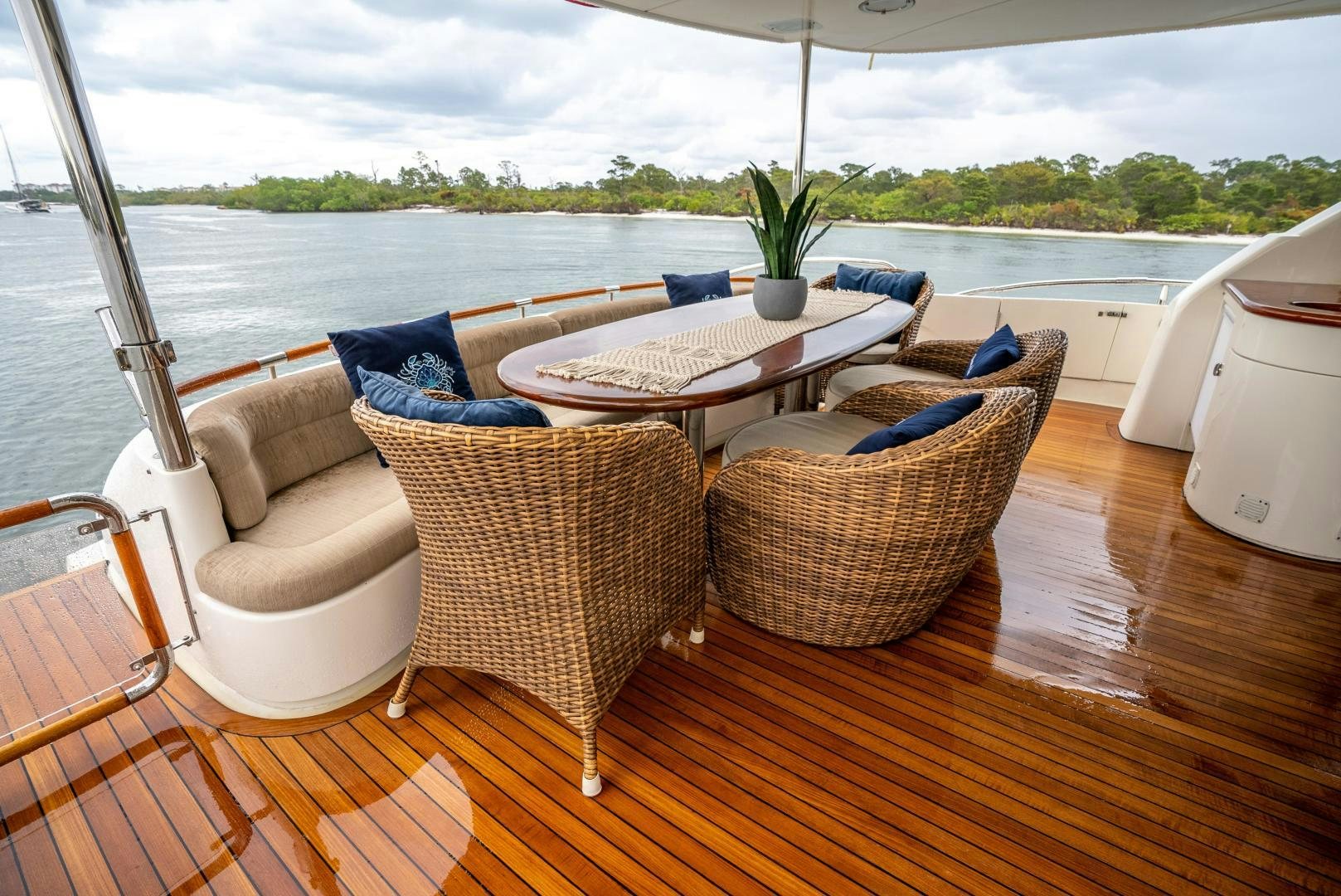 a table with chairs on it aboard STARFIRE Yacht for Sale