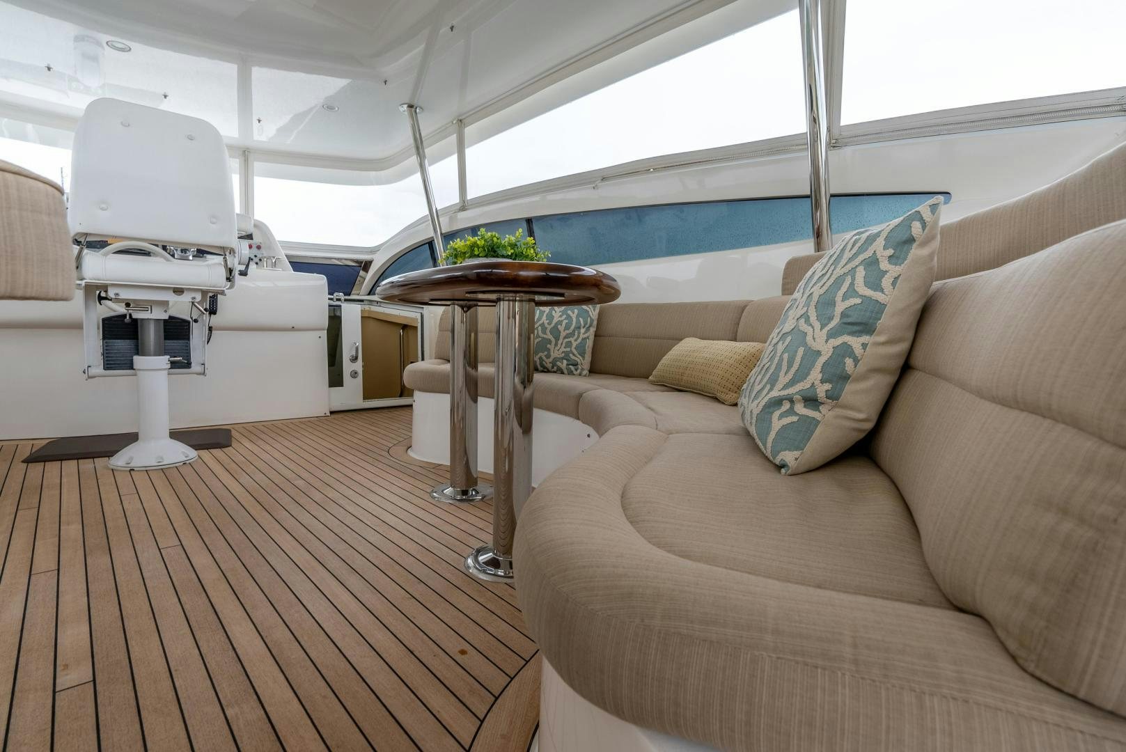 a boat with a table and chairs aboard STARFIRE Yacht for Sale