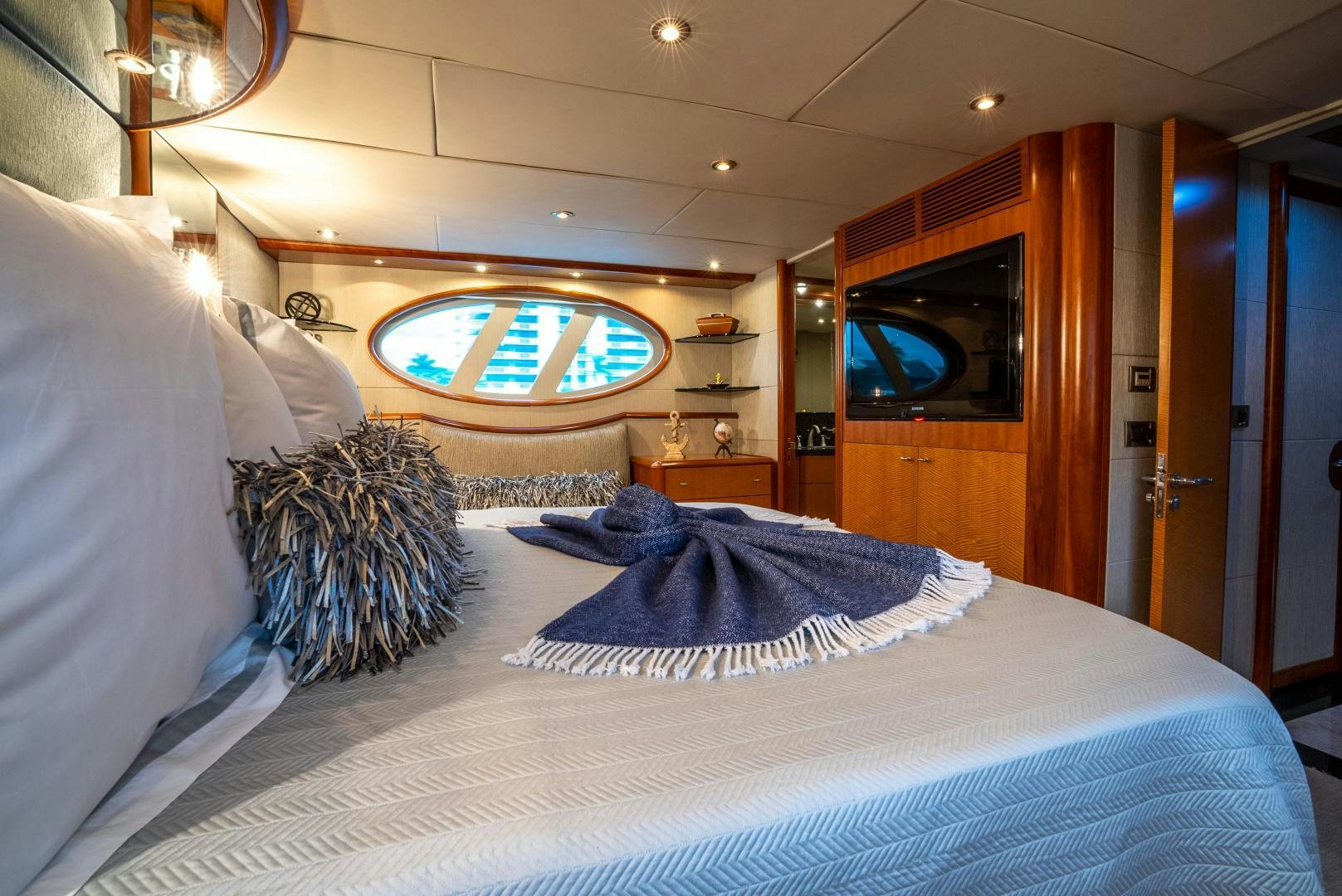 a hotel room with a bed aboard STARFIRE Yacht for Sale