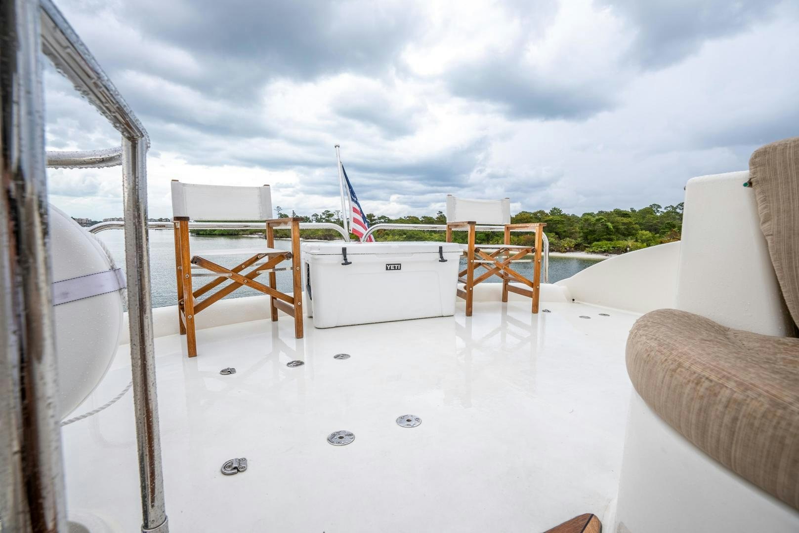 a room with chairs and a table aboard STARFIRE Yacht for Sale
