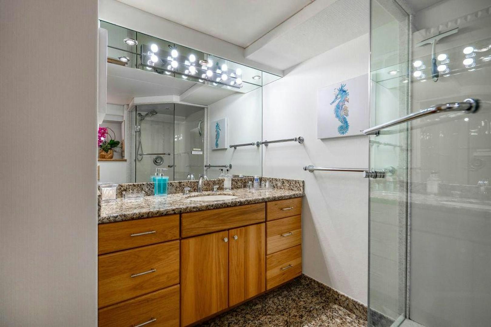 a bathroom with a shower unit and sink aboard THREE BLESSINGS Yacht for Sale