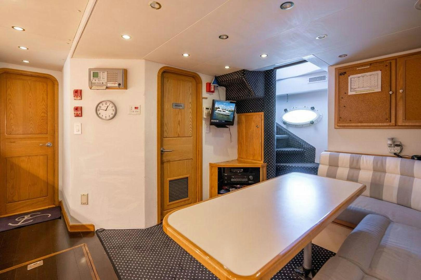 a large kitchen and dining area aboard THREE BLESSINGS Yacht for Sale