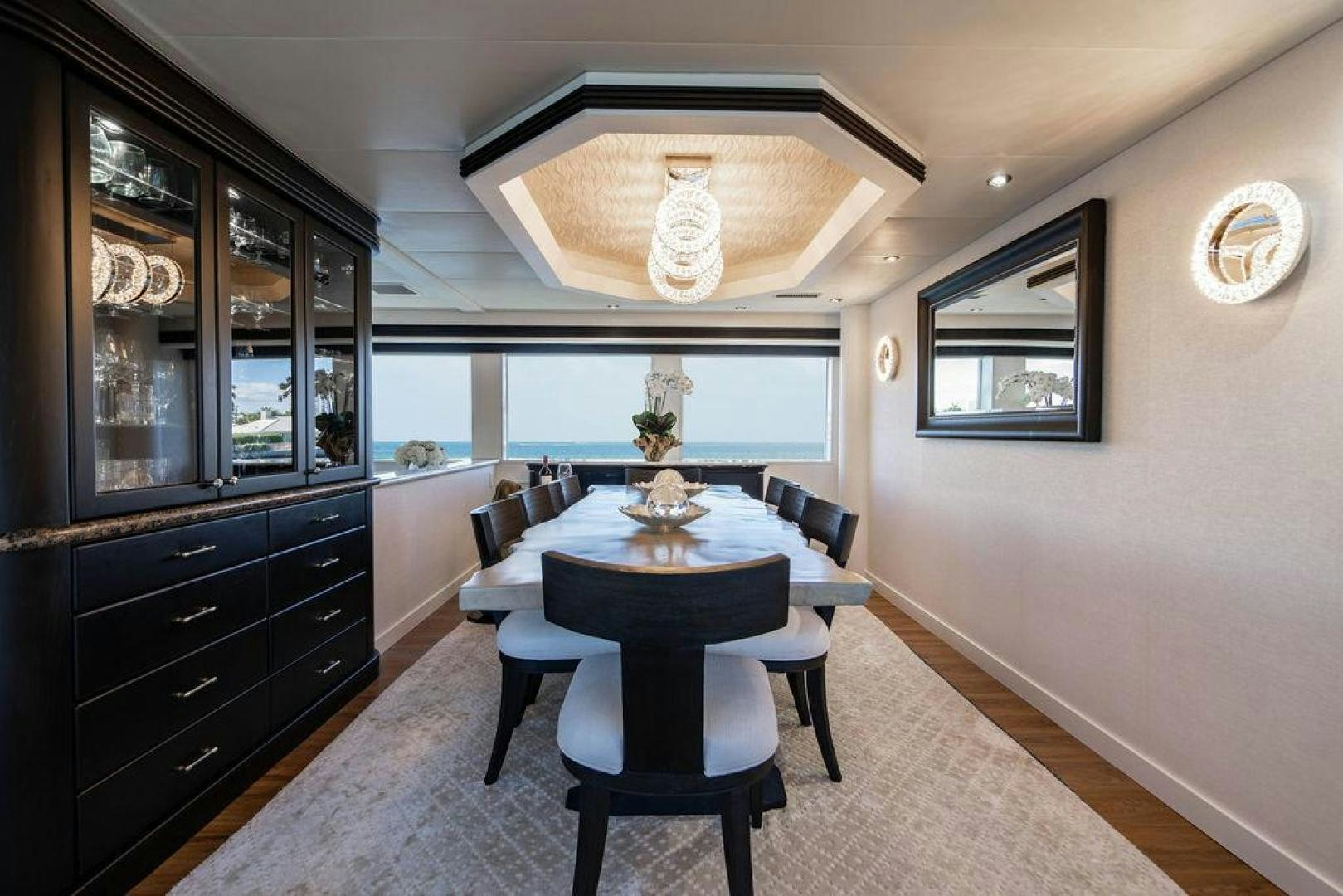 a dining room with a large table aboard THREE BLESSINGS Yacht for Sale