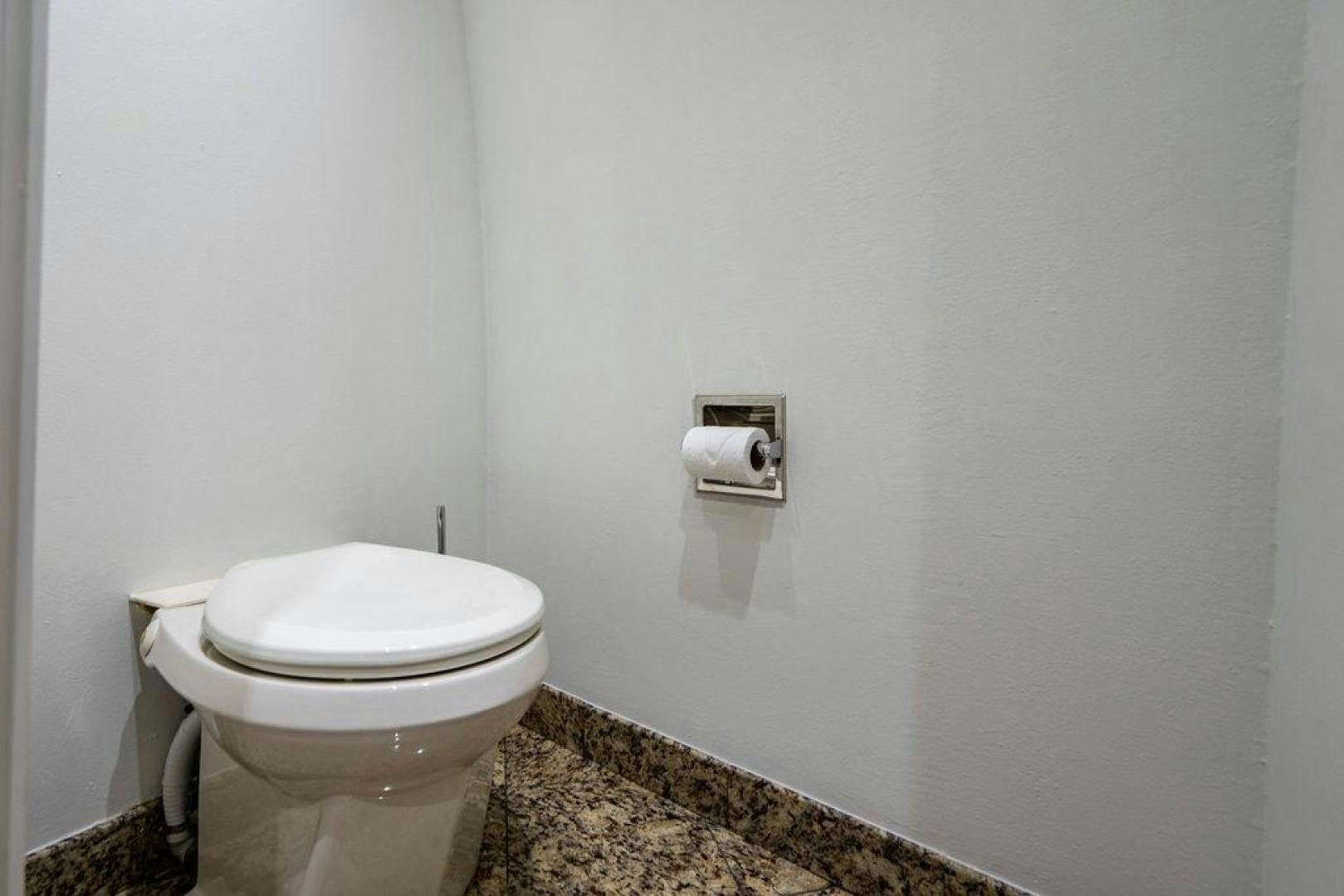 a toilet in a bathroom aboard THREE BLESSINGS Yacht for Sale