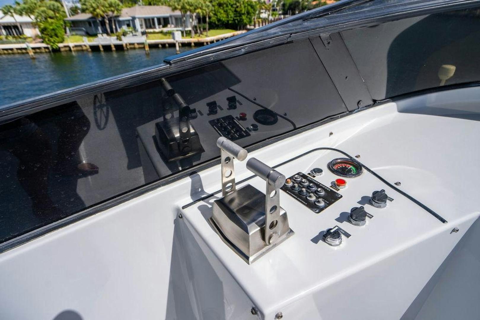 a white boat with black knobs aboard THREE BLESSINGS Yacht for Sale