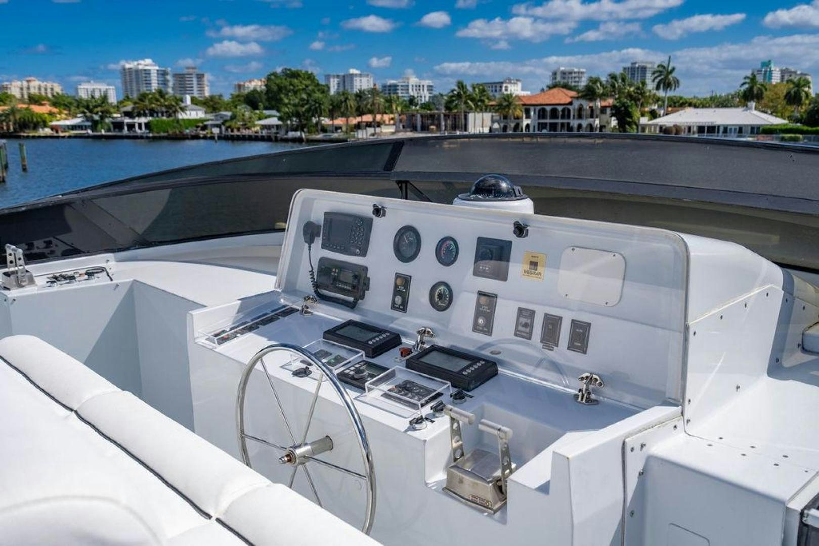 a white yacht on a river aboard THREE BLESSINGS Yacht for Sale