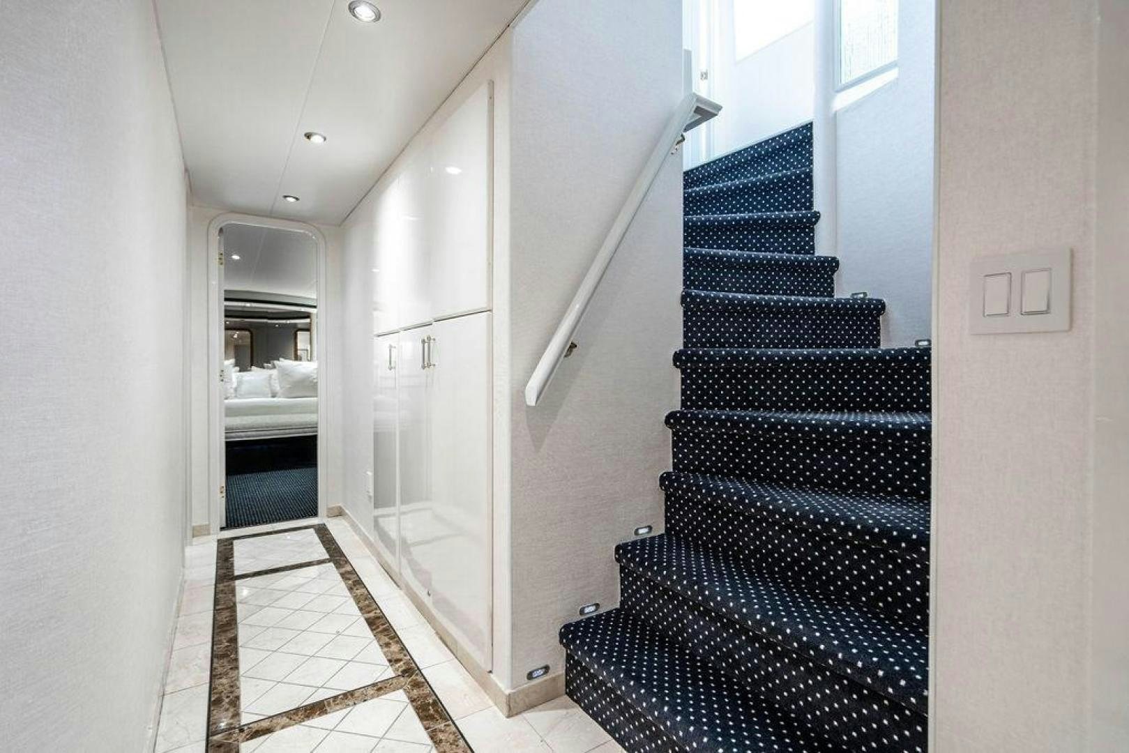 a staircase in a house aboard THREE BLESSINGS Yacht for Sale
