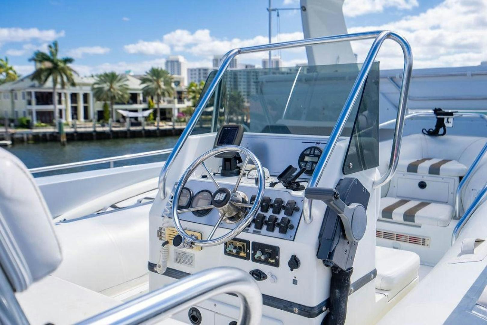 a boat with steering wheel aboard THREE BLESSINGS Yacht for Sale