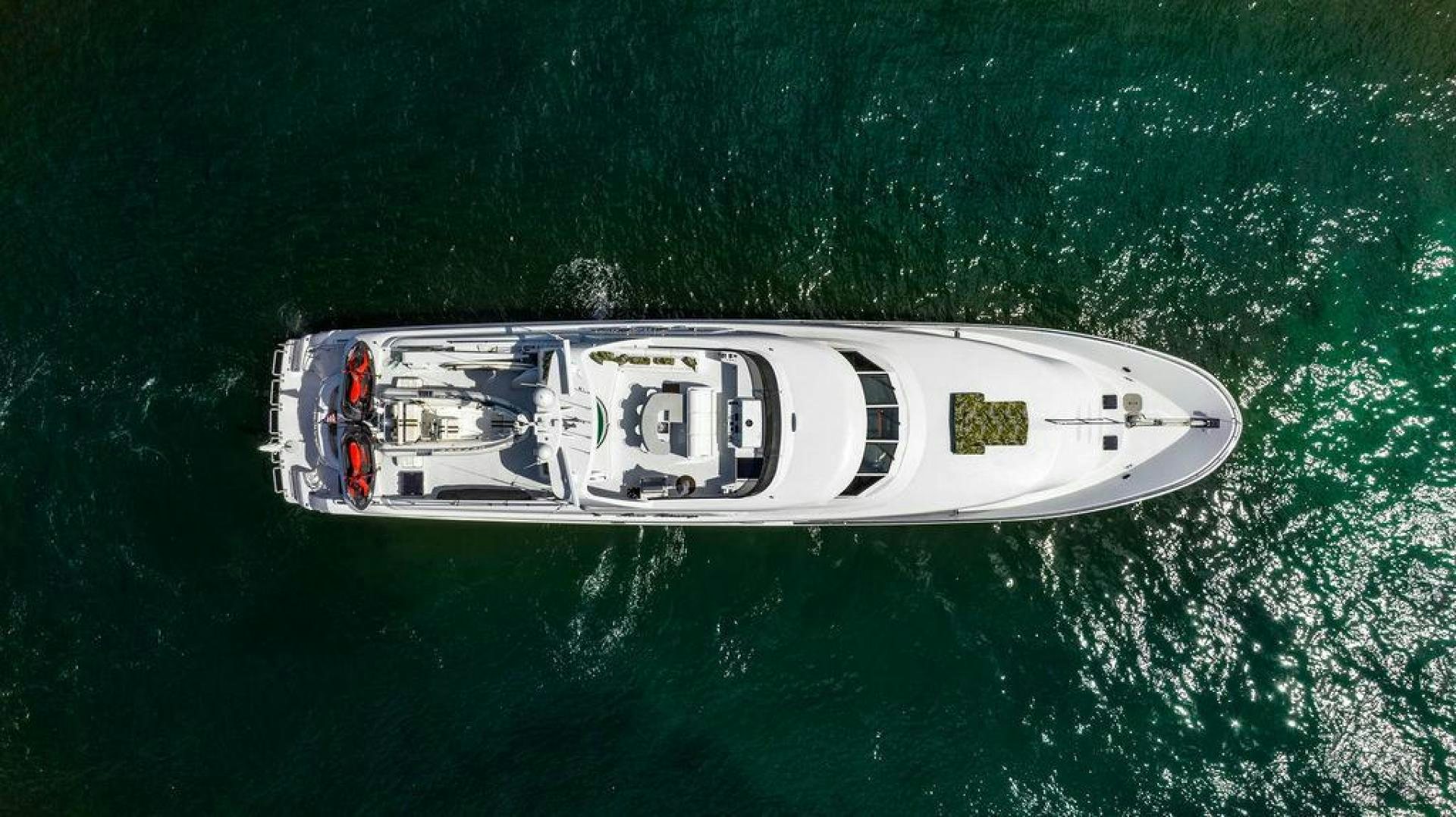 a white and black vehicle in the water aboard THREE BLESSINGS Yacht for Sale