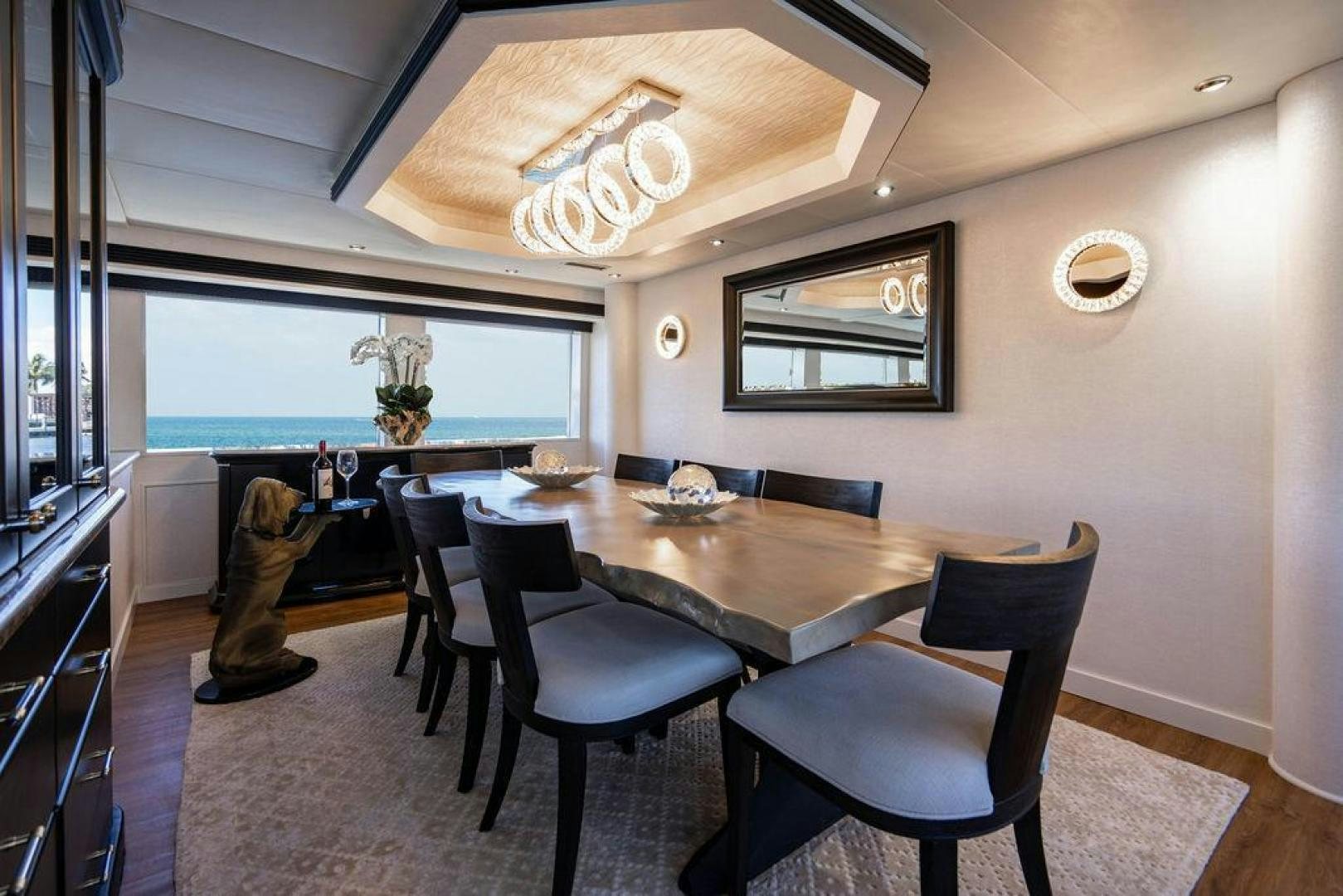 a dining room with a large table aboard THREE BLESSINGS Yacht for Sale