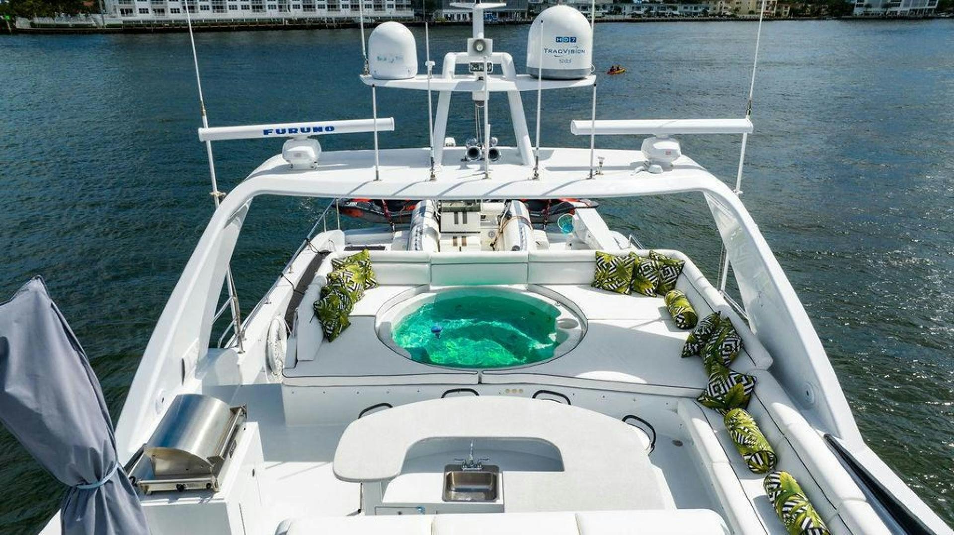 a white boat with flowers on it aboard THREE BLESSINGS Yacht for Sale