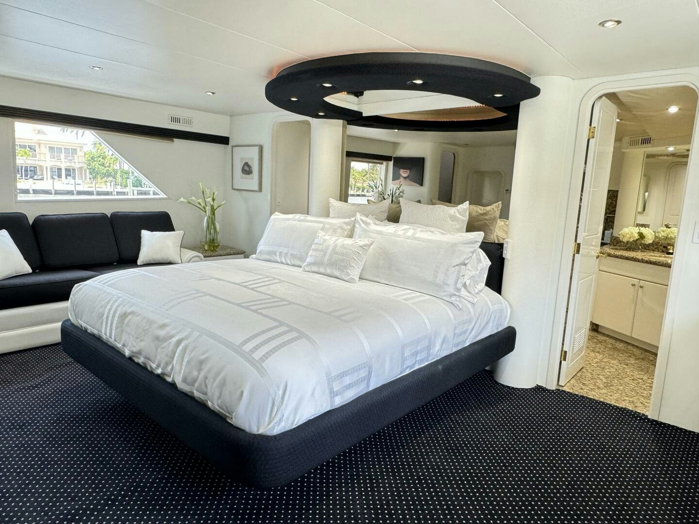 a large bed in a room aboard THREE BLESSINGS Yacht for Sale