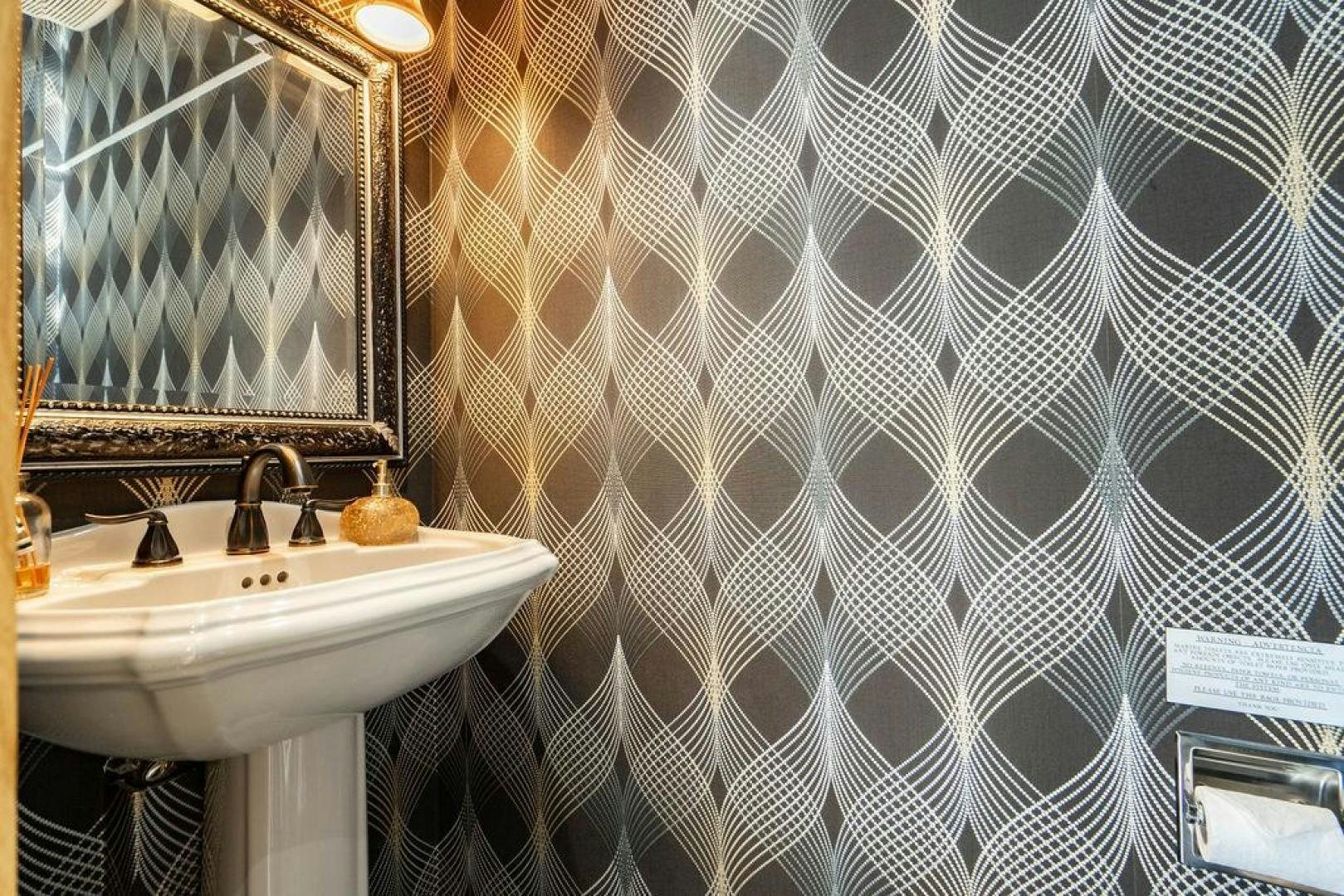 a bathroom with a sink and a mirror aboard THREE BLESSINGS Yacht for Sale