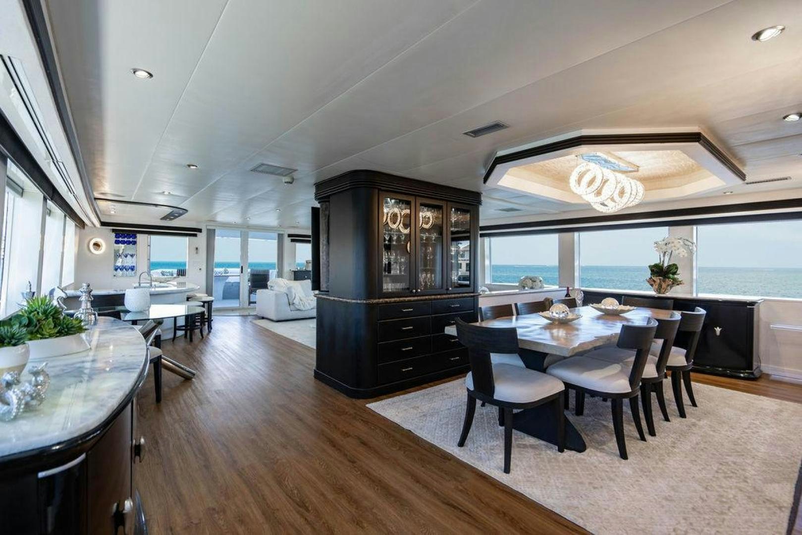a kitchen and dining area aboard THREE BLESSINGS Yacht for Sale
