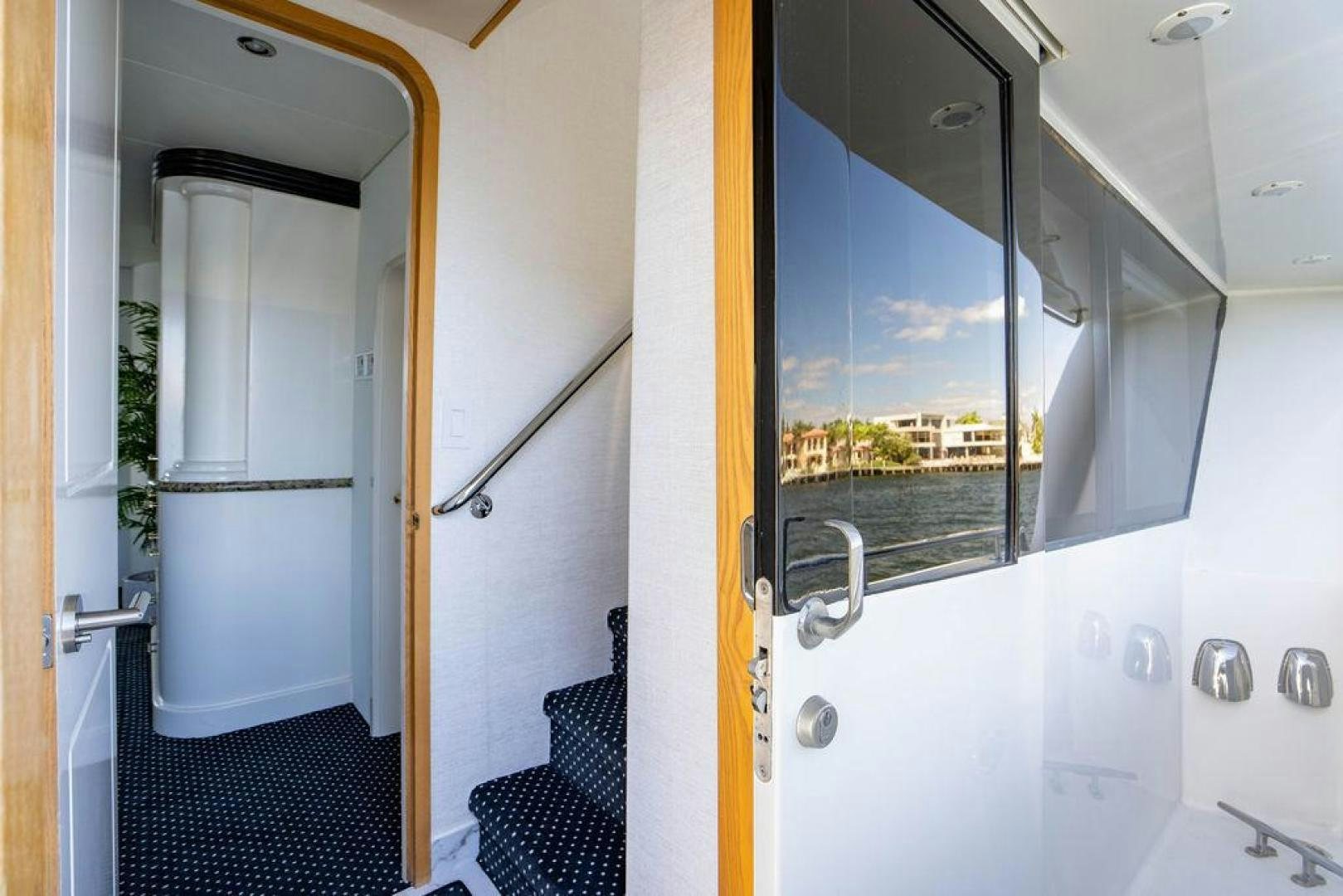 a bathroom with a large window aboard THREE BLESSINGS Yacht for Sale