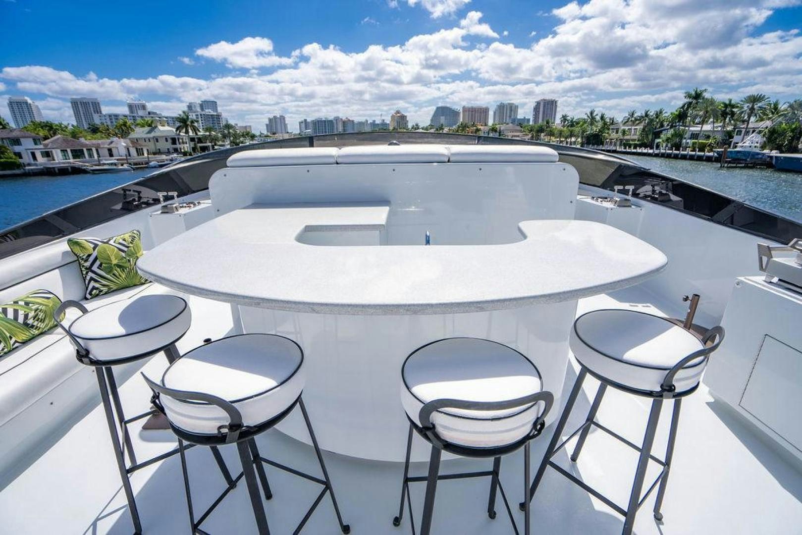 a table with chairs around it aboard THREE BLESSINGS Yacht for Sale