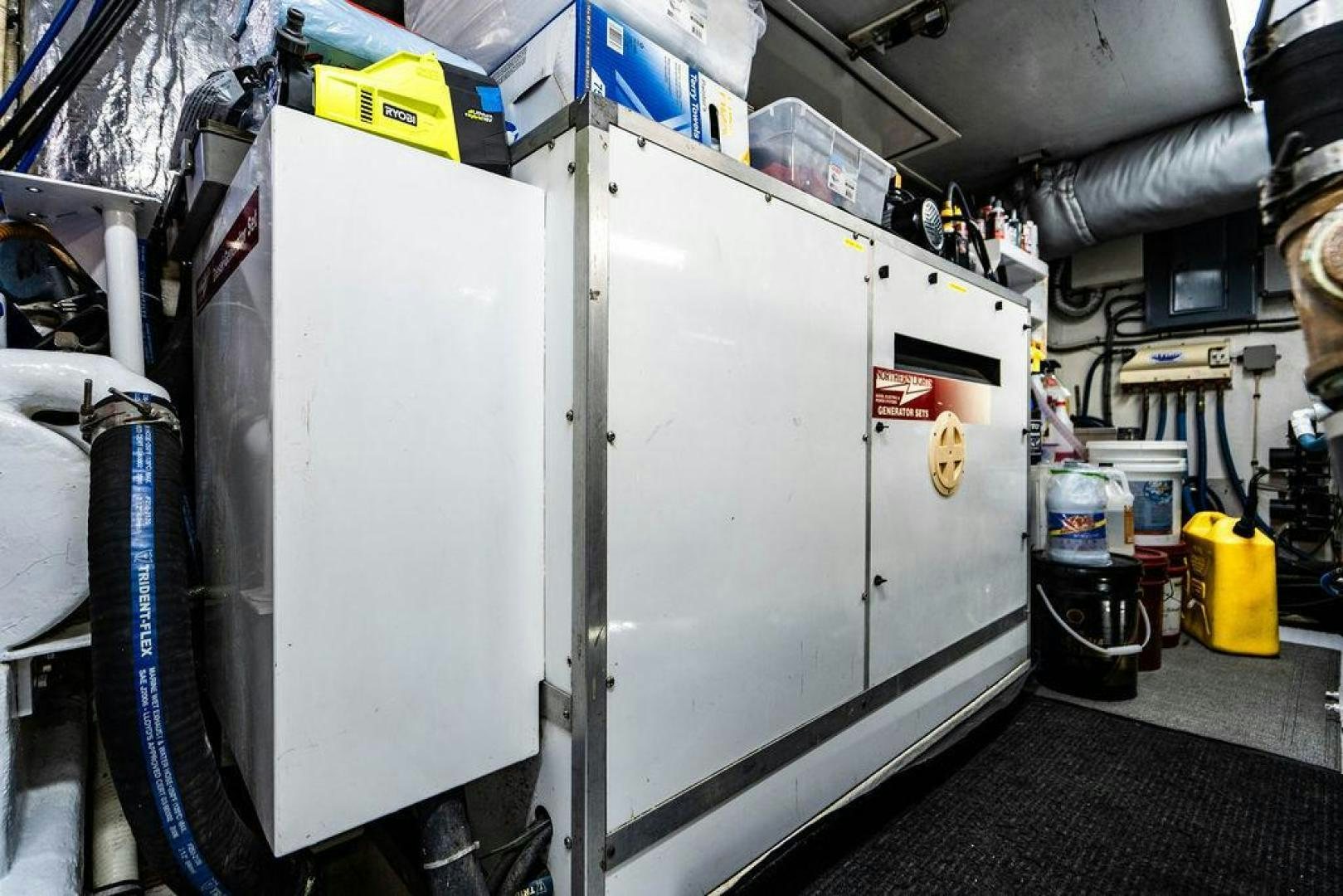 a large white machine in a factory aboard THREE BLESSINGS Yacht for Sale