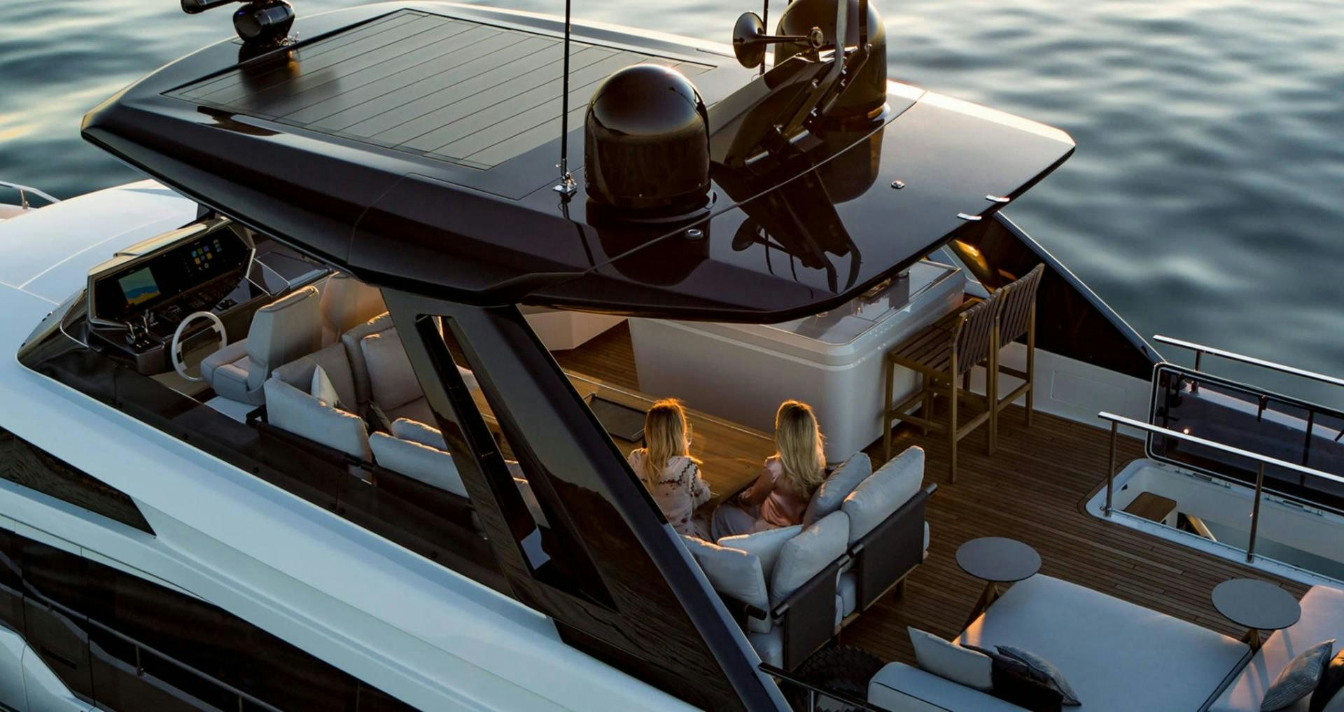 a boat with a couple of people on it aboard ALVEARE Yacht for Sale
