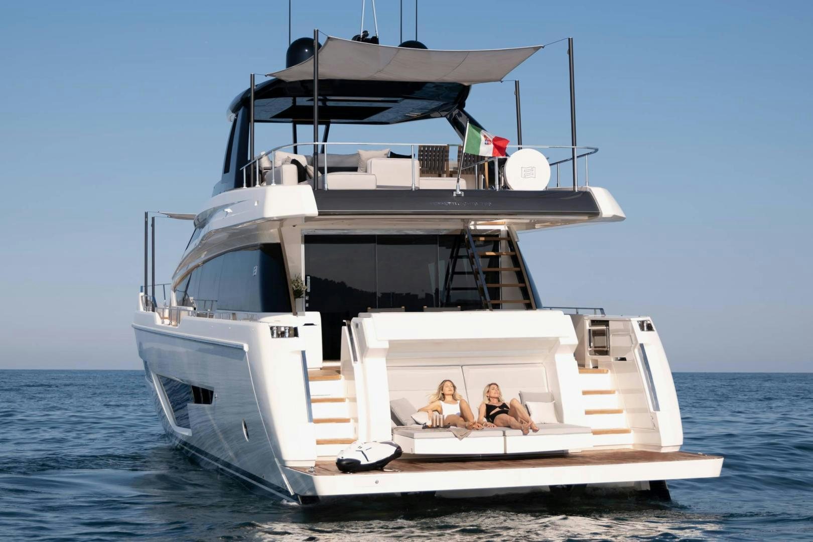 a boat with a couple of people on it aboard ALVEARE Yacht for Sale