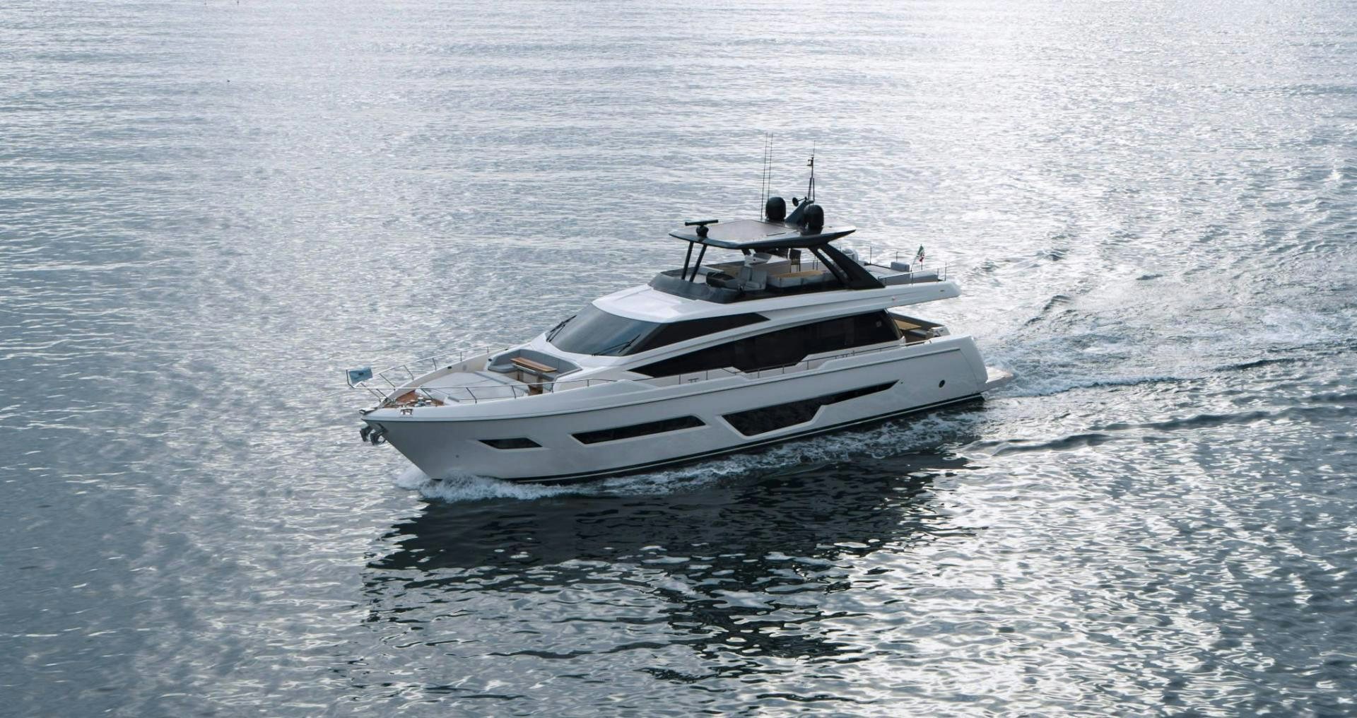 a white yacht in the water aboard ALVEARE Yacht for Sale