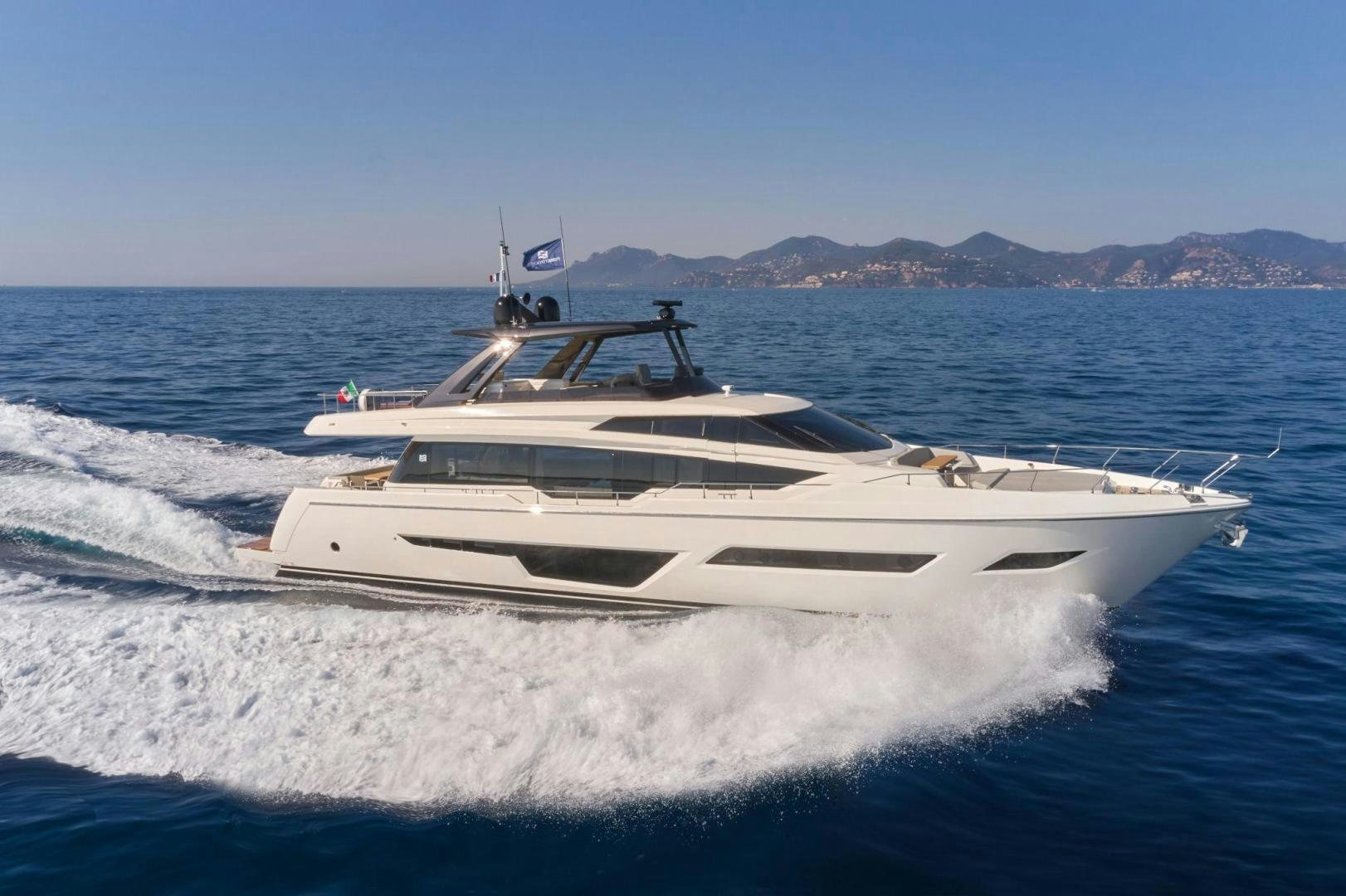 a white yacht on the water aboard ALVEARE Yacht for Sale