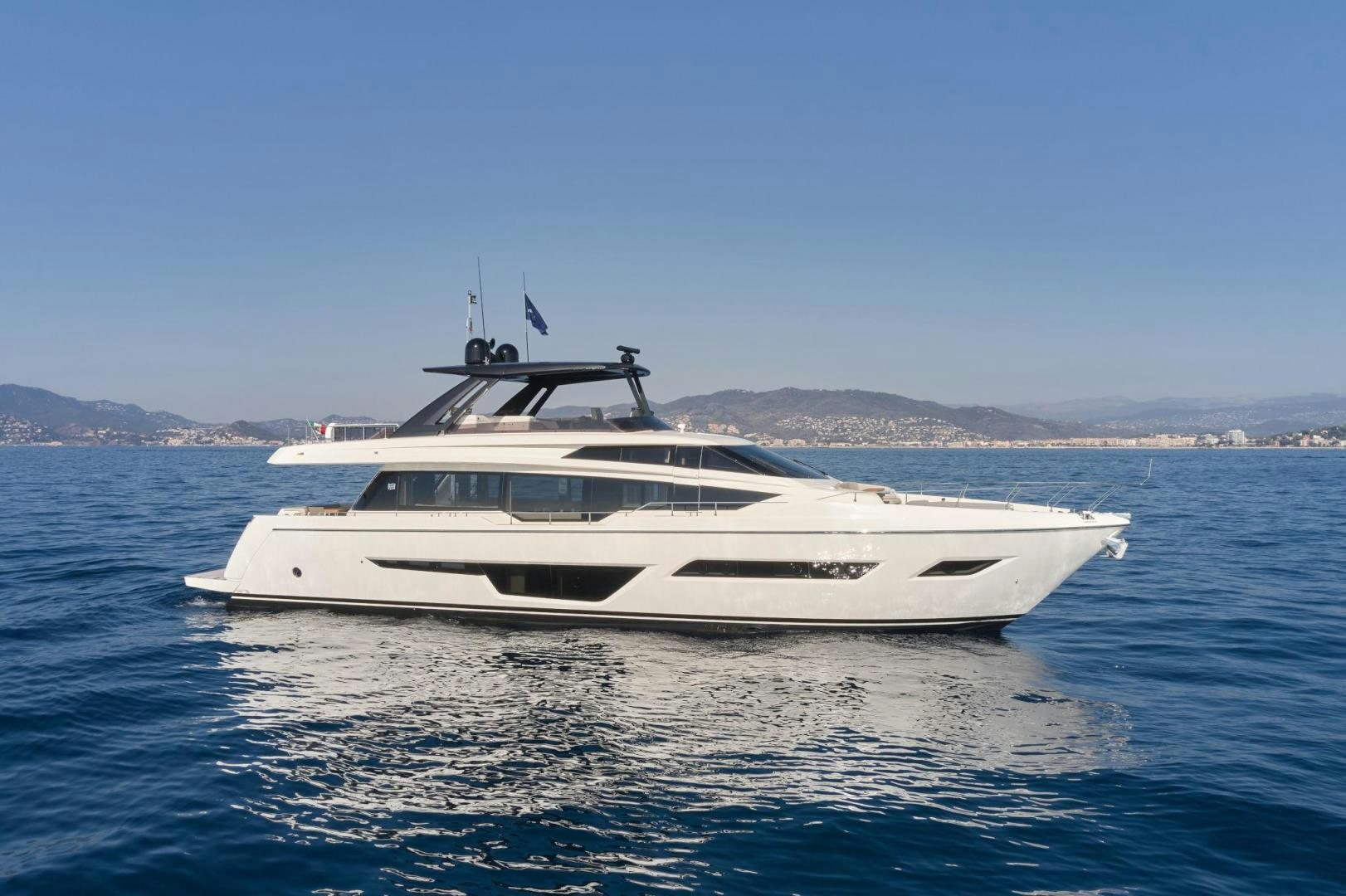 a white yacht in the water aboard ALVEARE Yacht for Sale