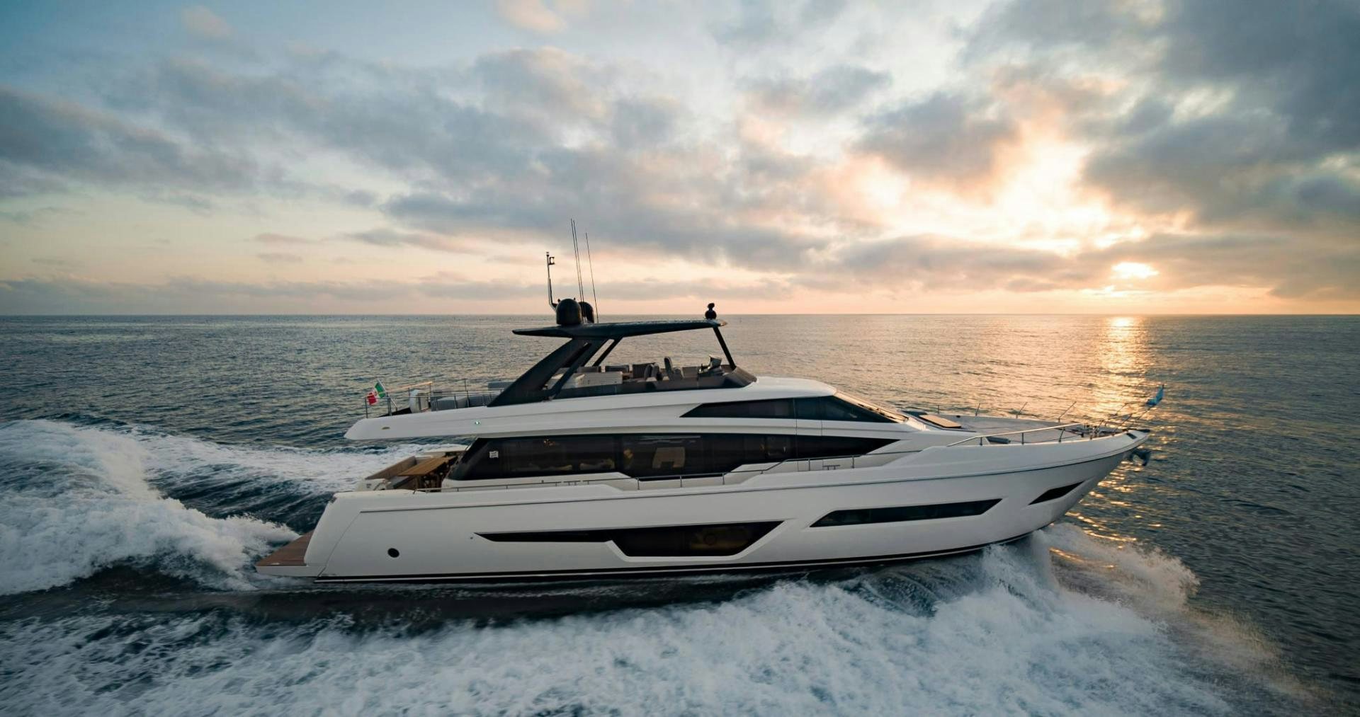 a white yacht on the water aboard ALVEARE Yacht for Sale