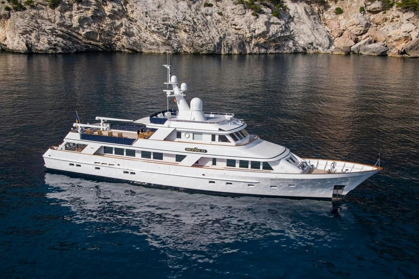 a white yacht in the water aboard MONACO Yacht for Sale