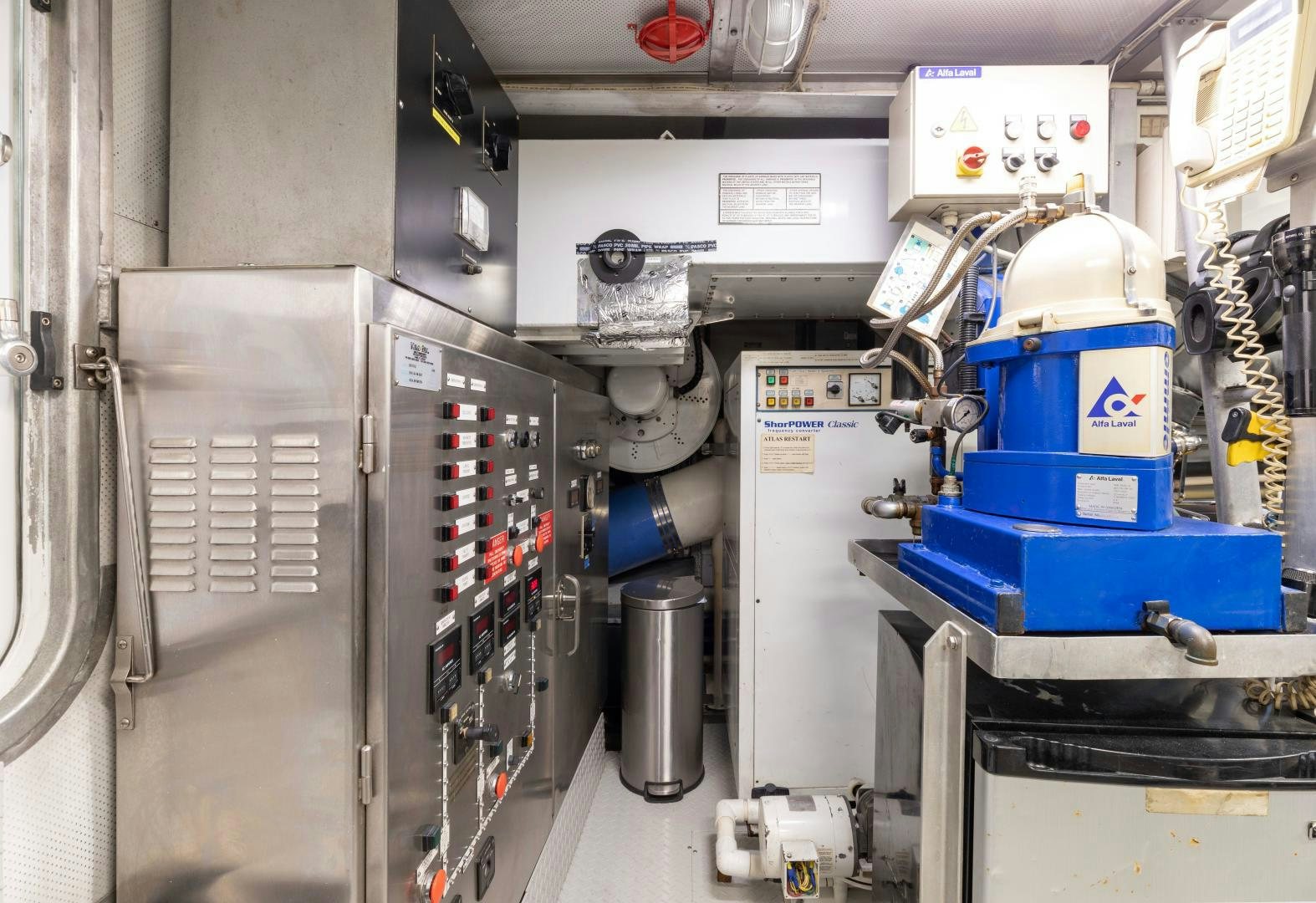 a machine in a room aboard SIMARON Yacht for Sale