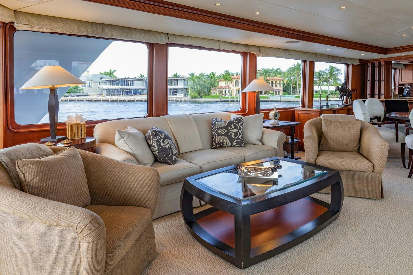 a living room with a large window aboard SIMARON Yacht for Sale