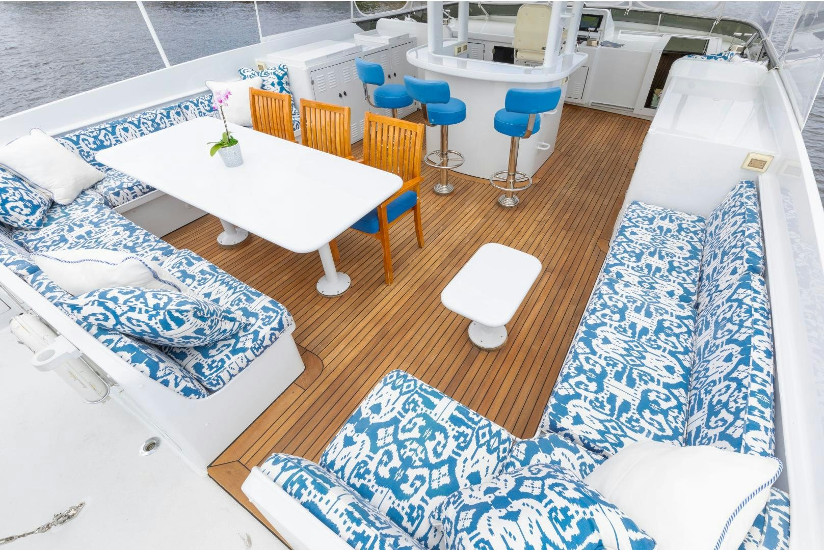 a room with tables chairs and a rug aboard SIMARON Yacht for Sale