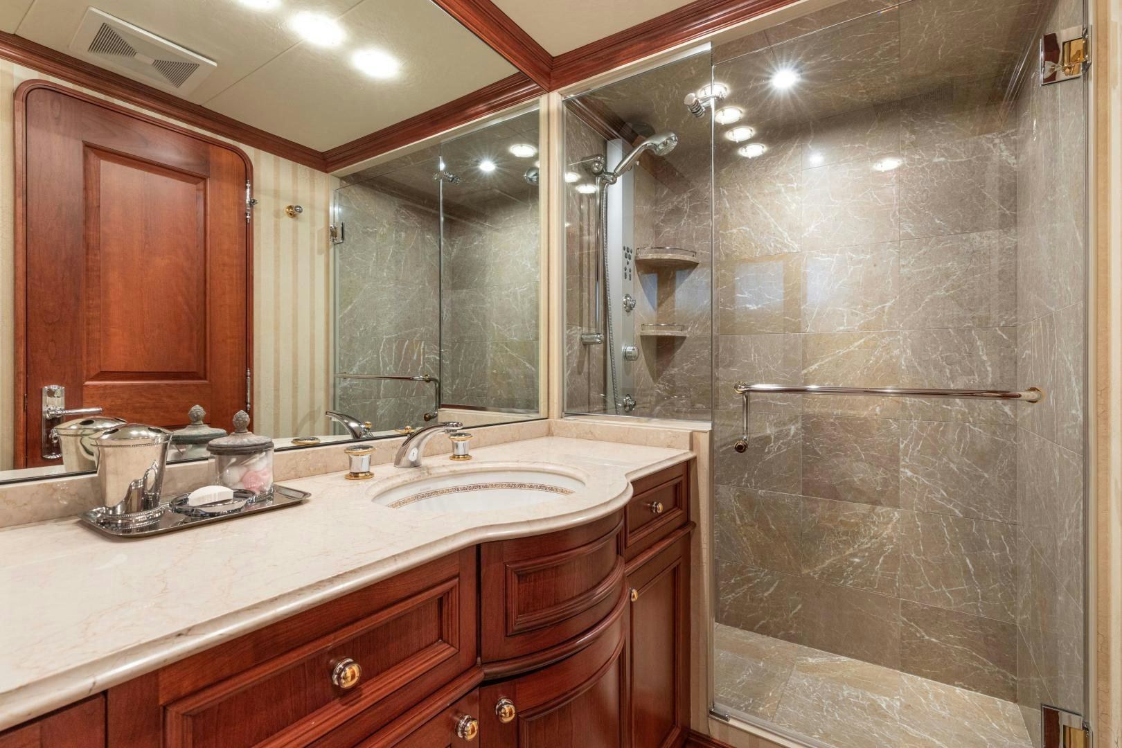 a bathroom with a shower and sink aboard SIMARON Yacht for Sale