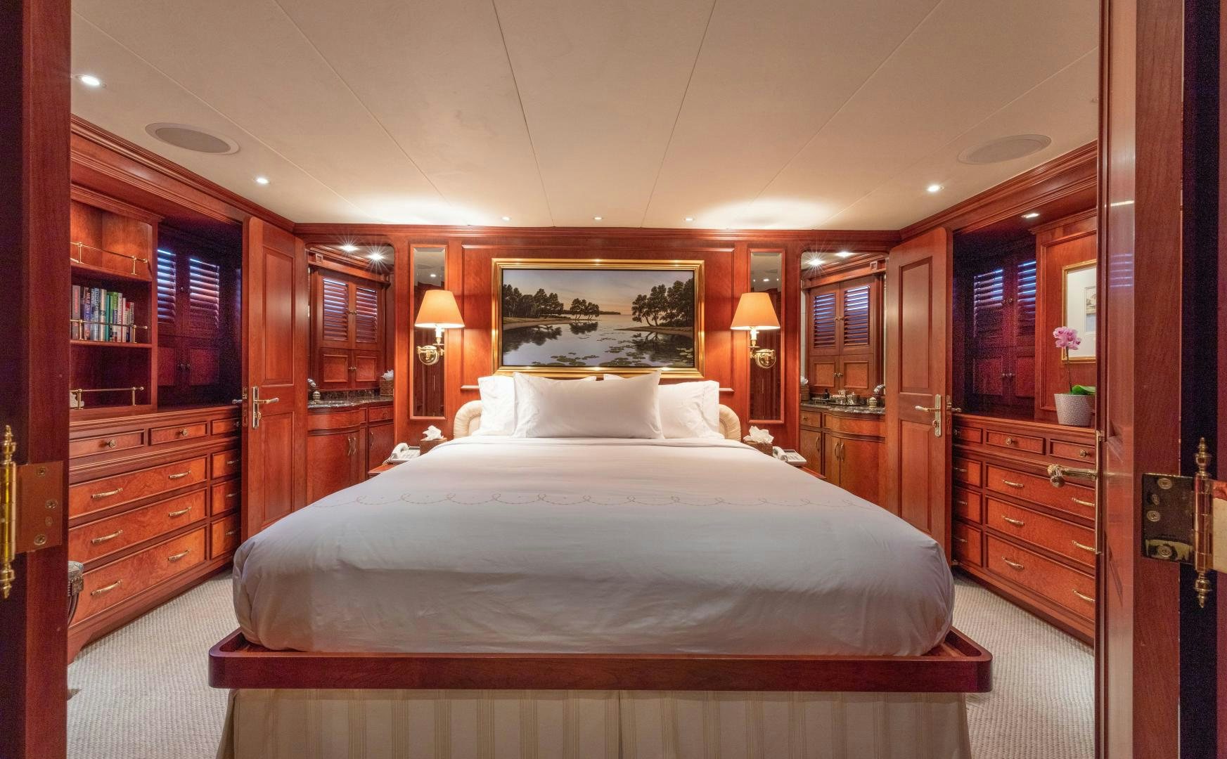 a large bed in a room aboard SIMARON Yacht for Sale