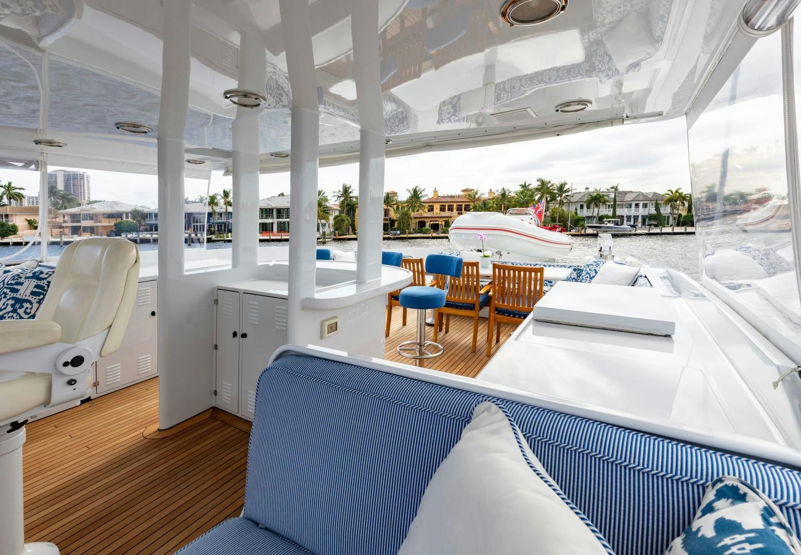 a room with a large window and a view of the city aboard SIMARON Yacht for Sale