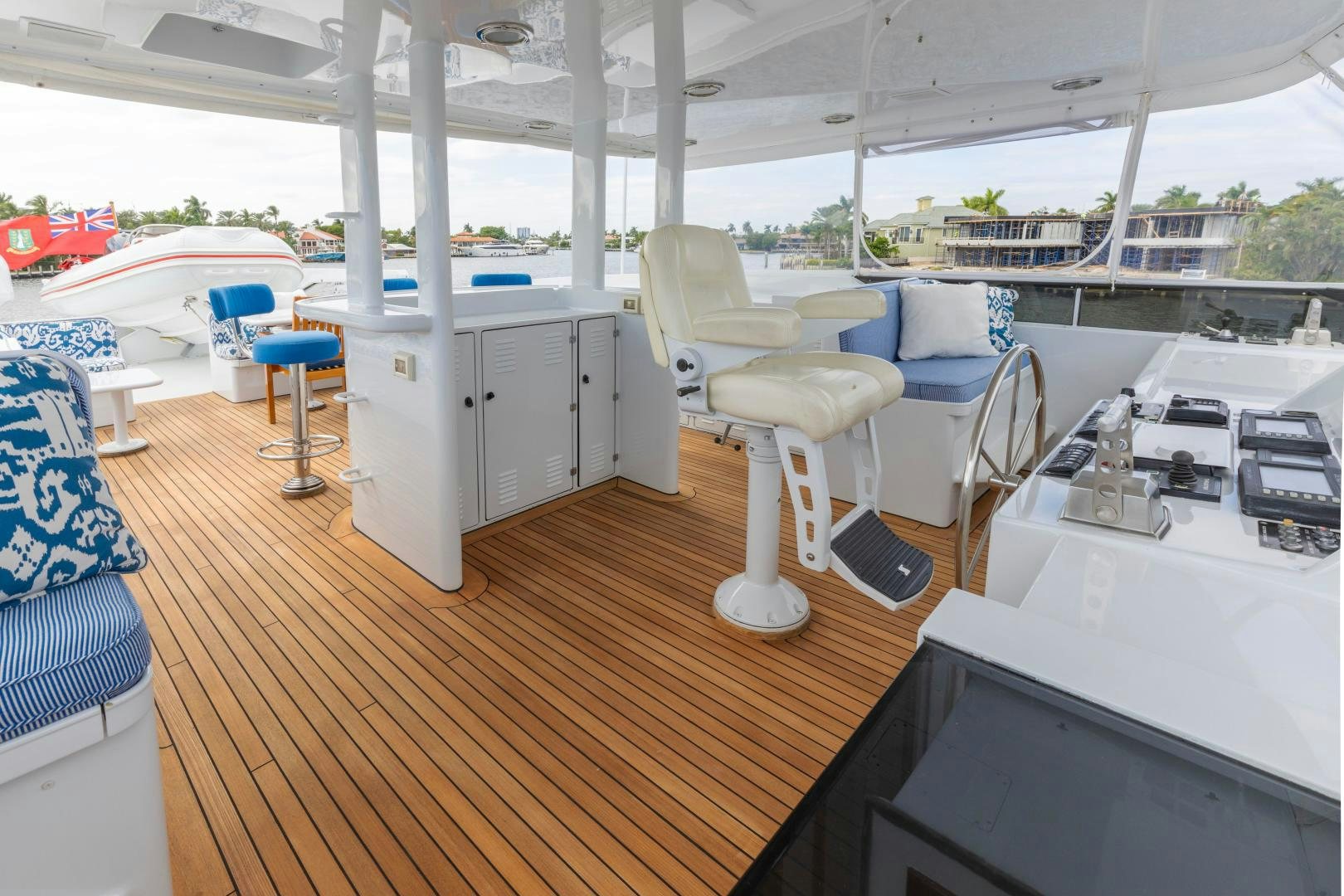 a boat with a deck and chairs aboard SIMARON Yacht for Sale