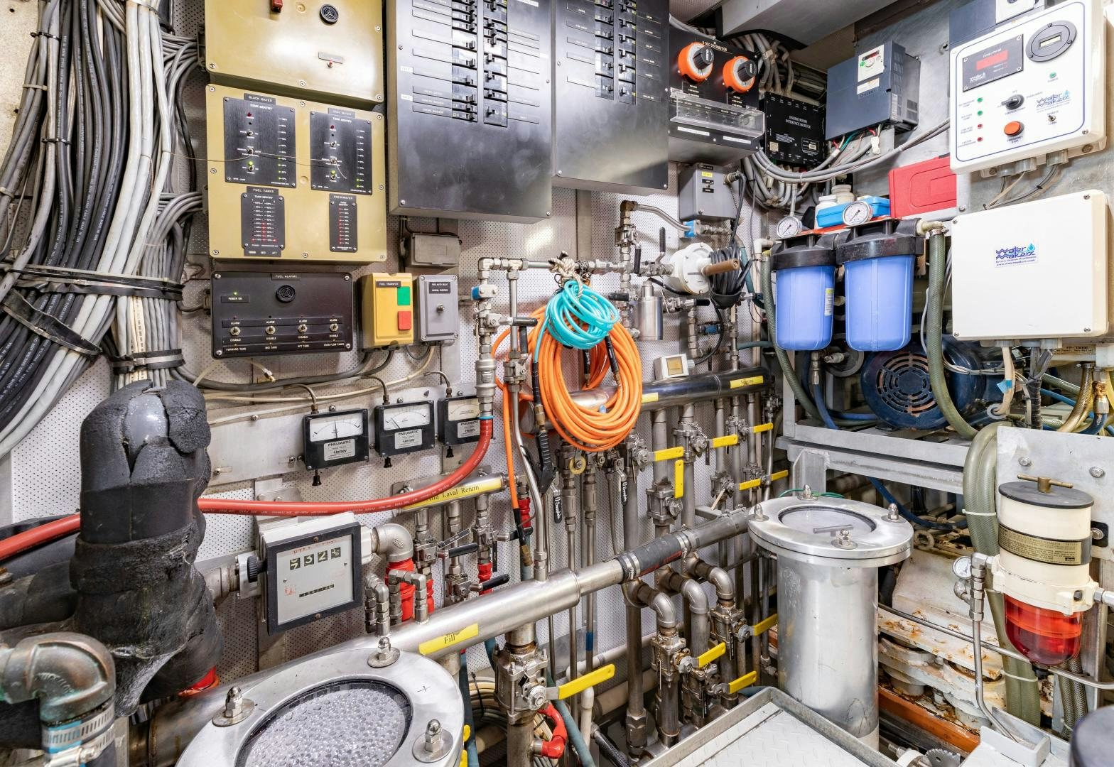 a room full of electrical equipment aboard SIMARON Yacht for Sale