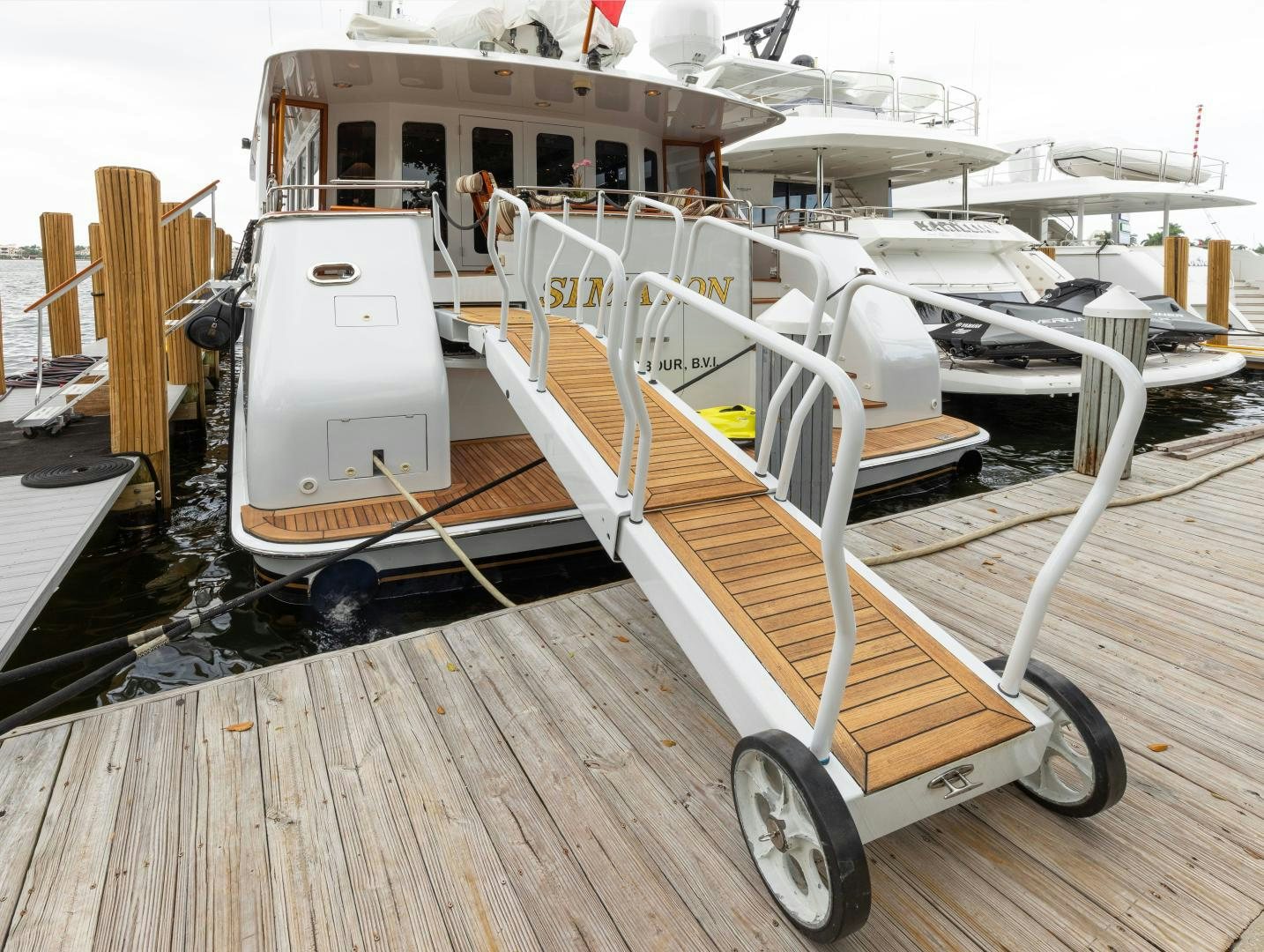 a wooden boat on a deck aboard SIMARON Yacht for Sale