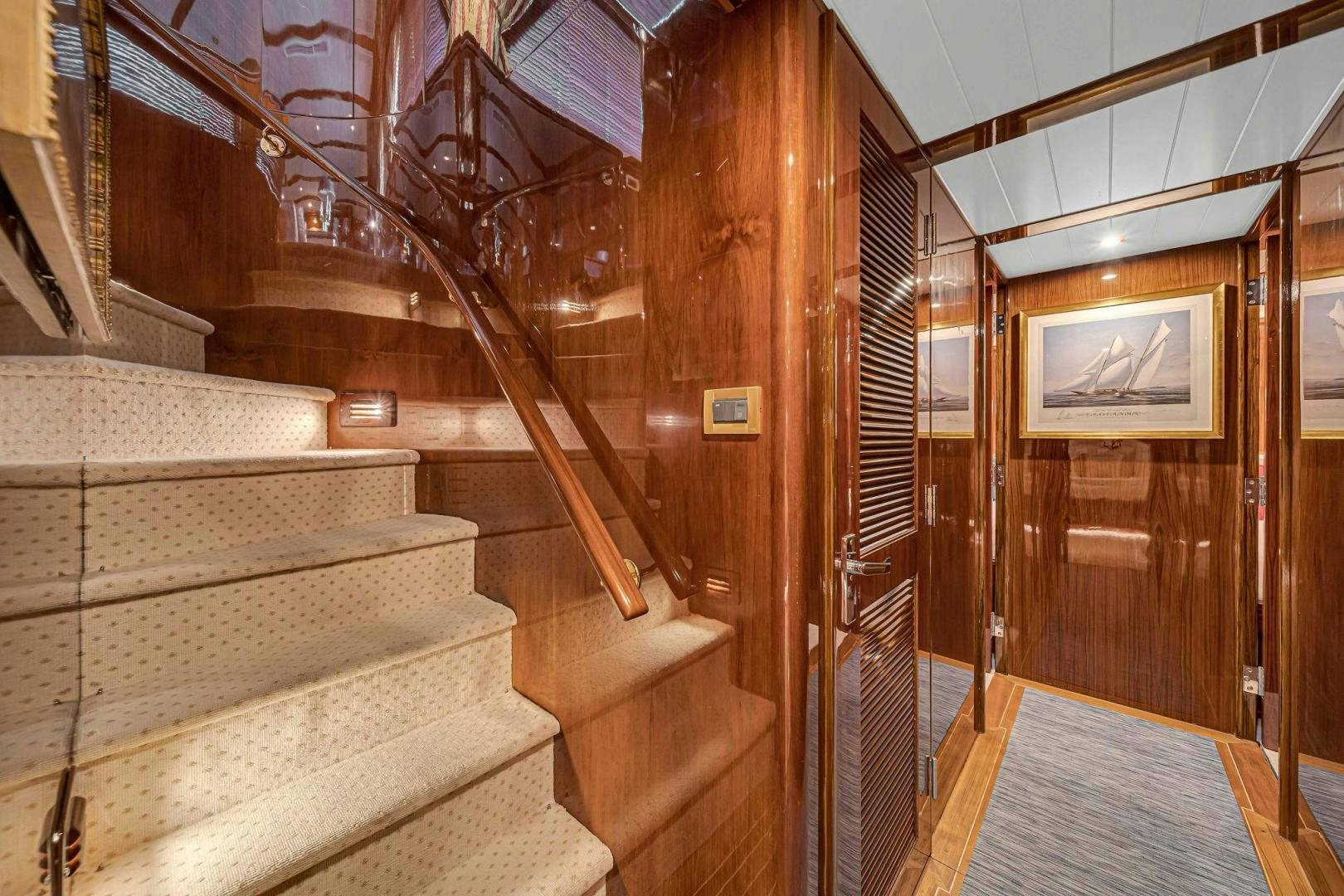 a staircase in a building aboard INEVITABLE Yacht for Sale