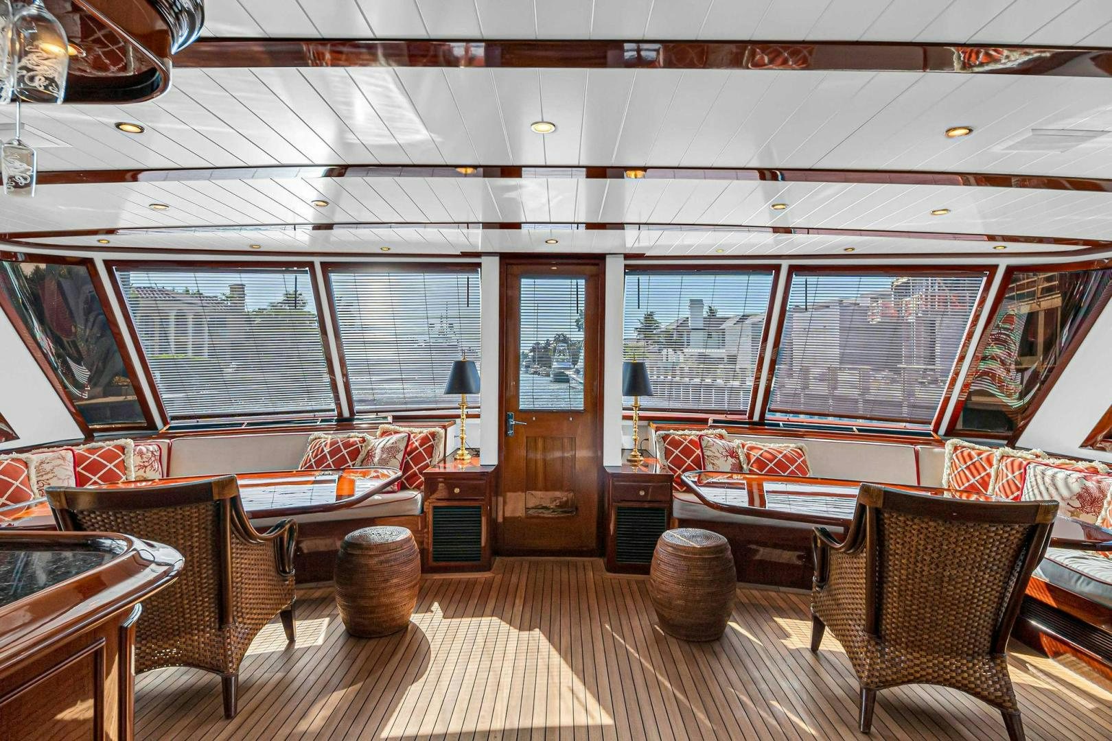 a room with a wood floor and a wood door aboard INEVITABLE Yacht for Sale