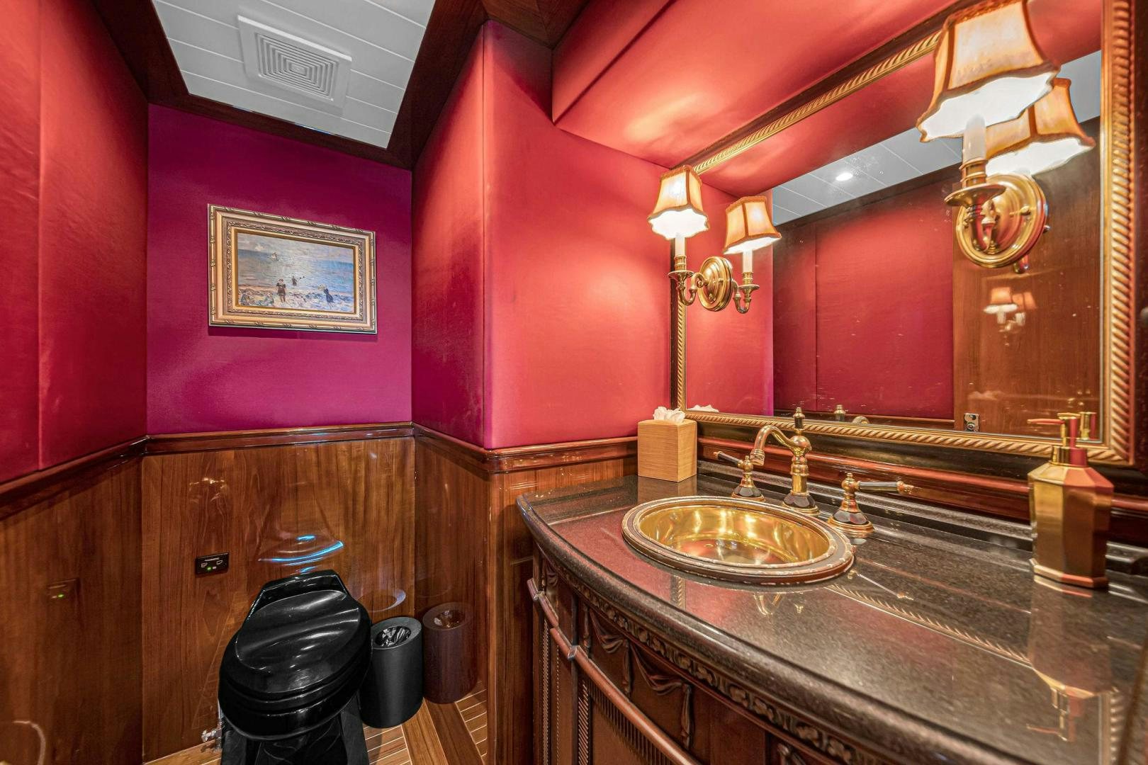 a bathroom with a sink and a mirror aboard INEVITABLE Yacht for Sale