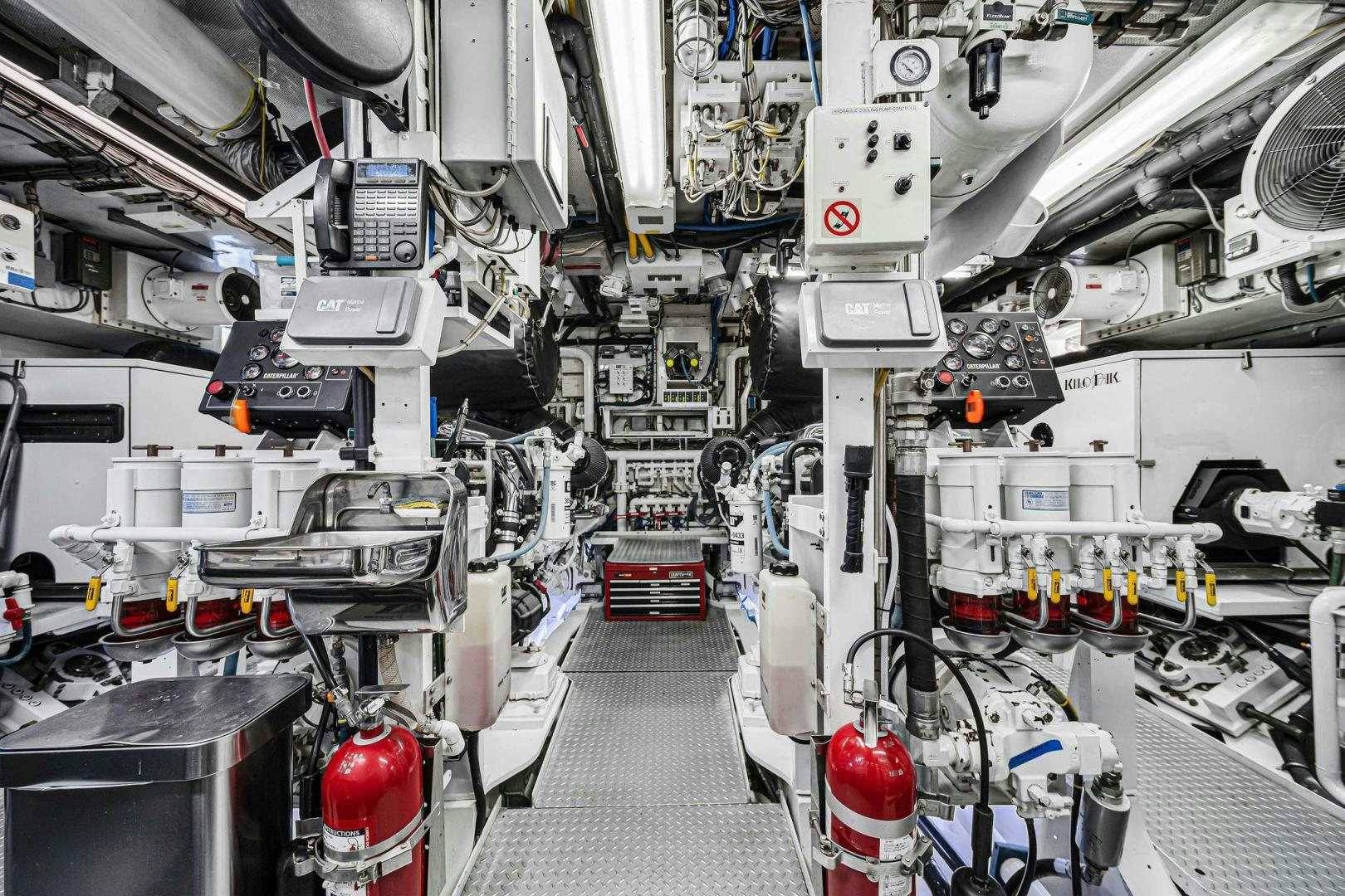 a room with many white pipes aboard INEVITABLE Yacht for Sale