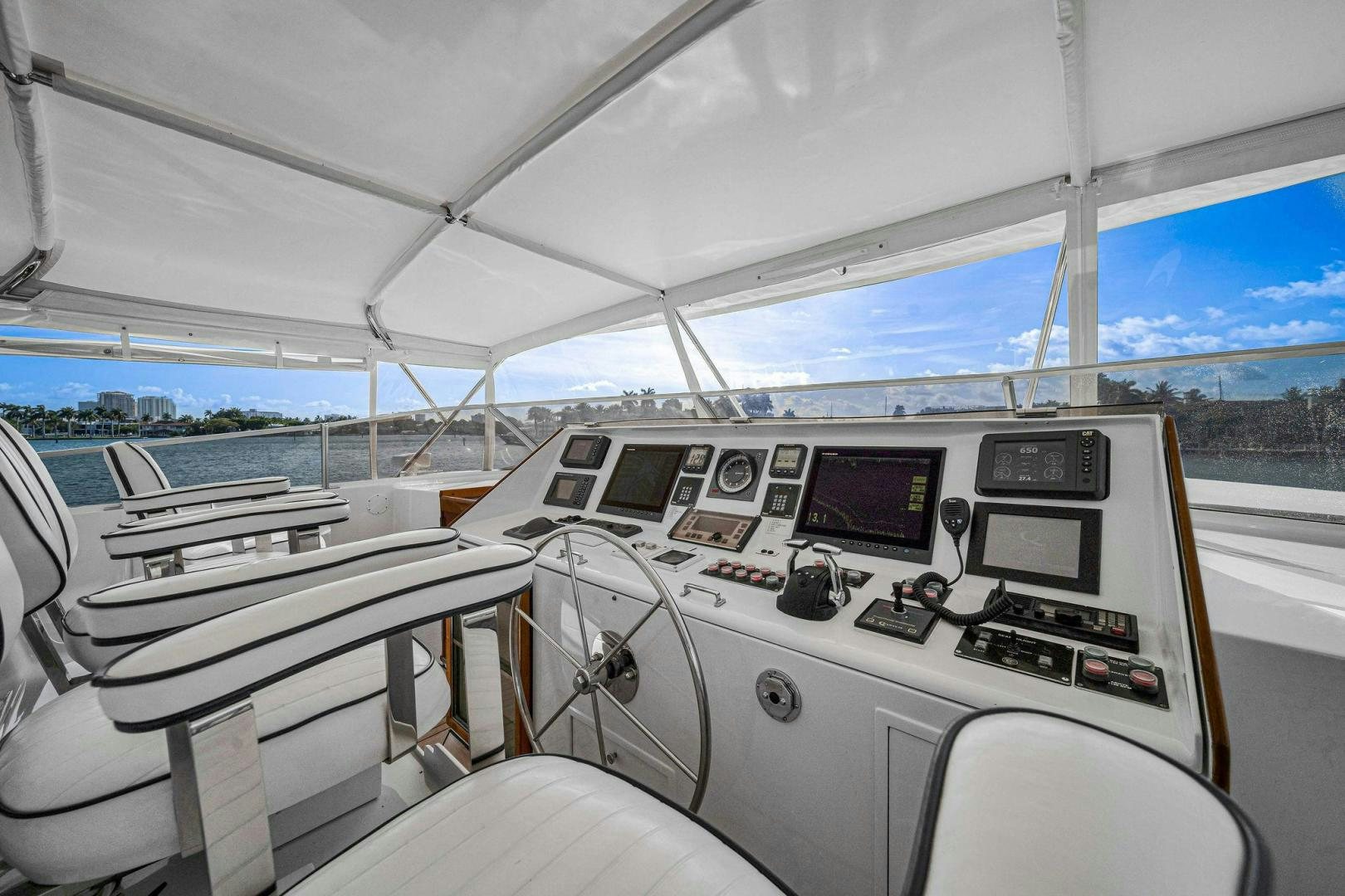 inside of a white car aboard INEVITABLE Yacht for Sale