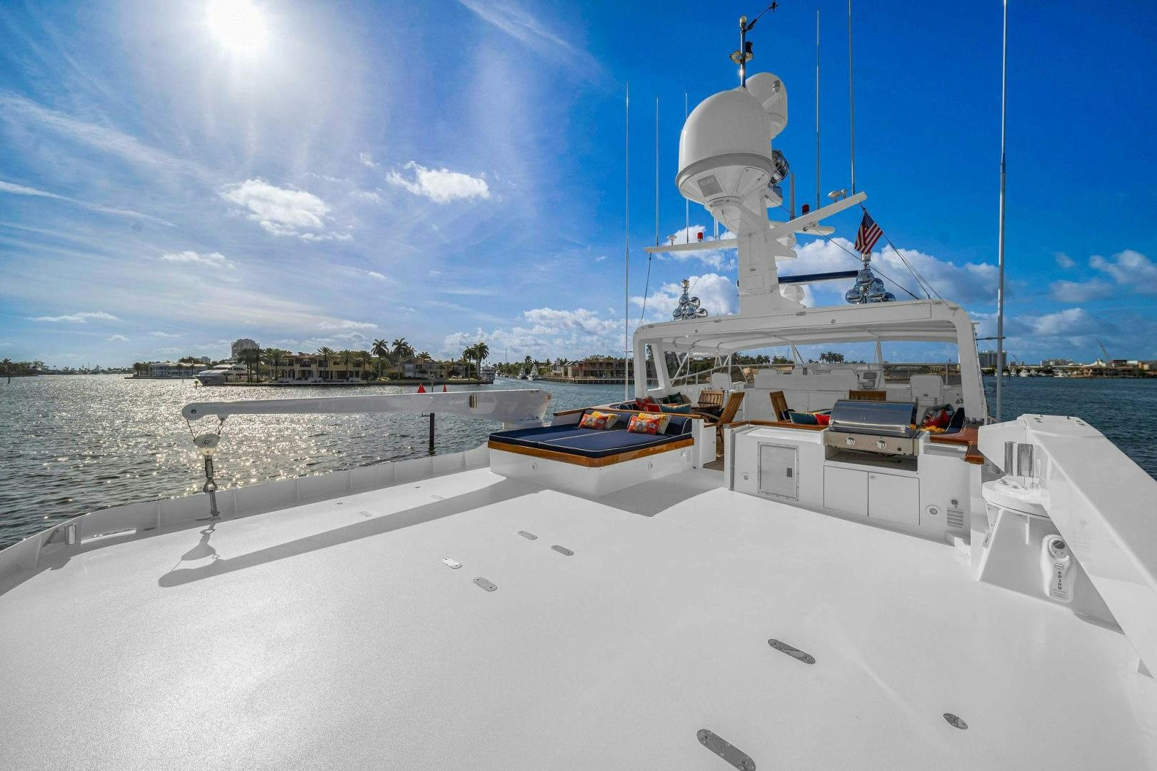 a large white building with a tower aboard INEVITABLE Yacht for Sale