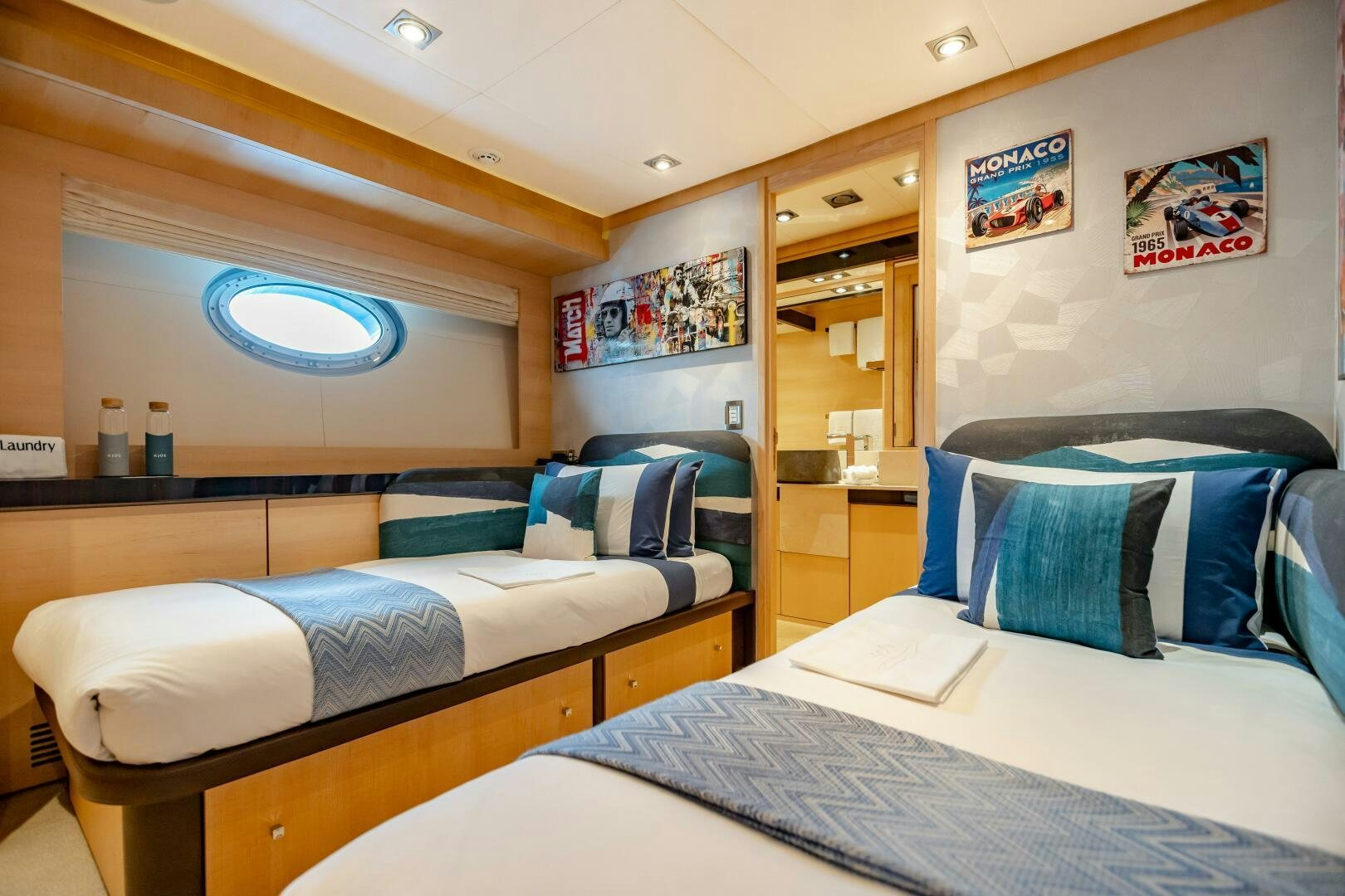 a couple of beds in a room aboard KJOS Yacht for Sale