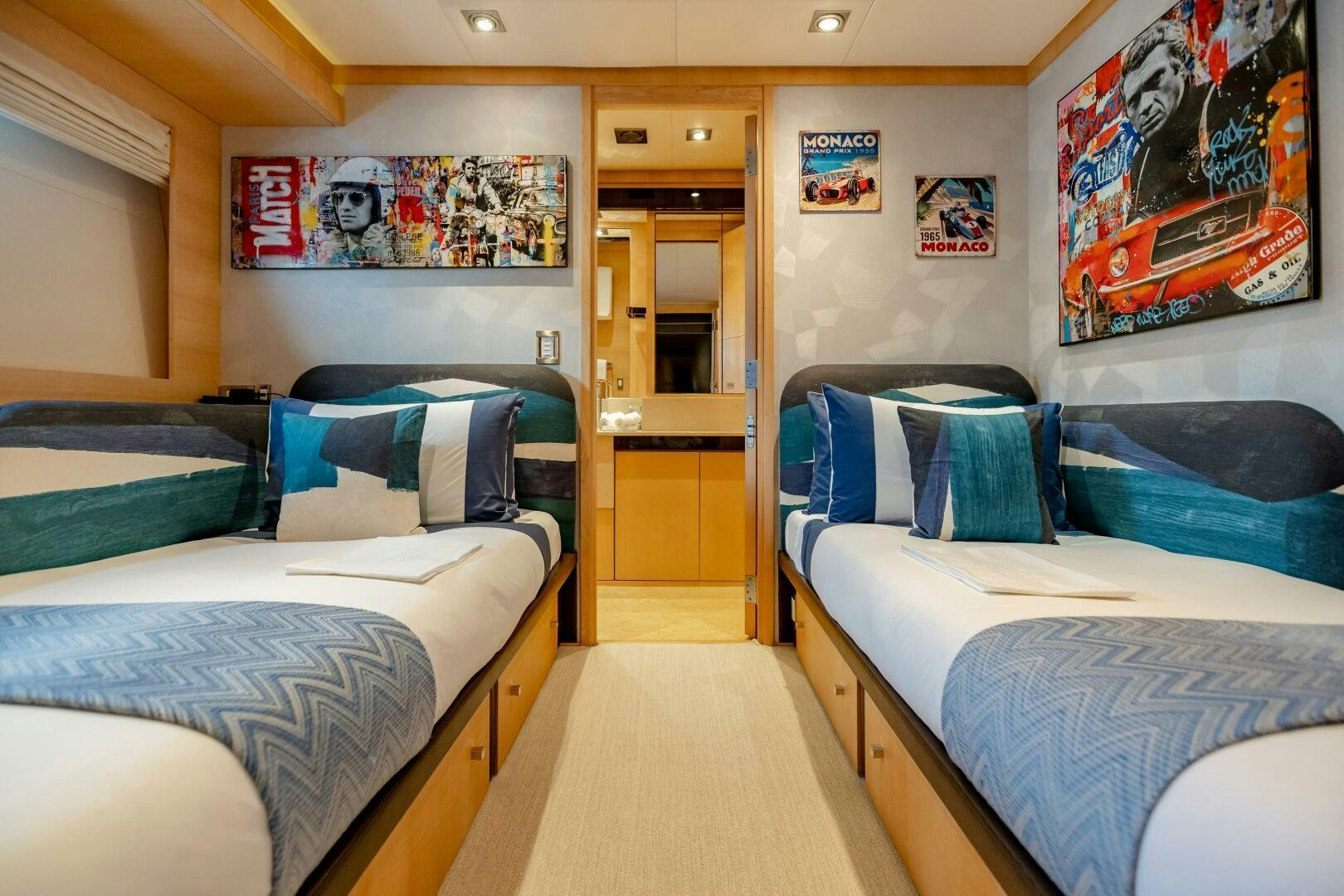 a couple of beds in a room aboard KJOS Yacht for Sale