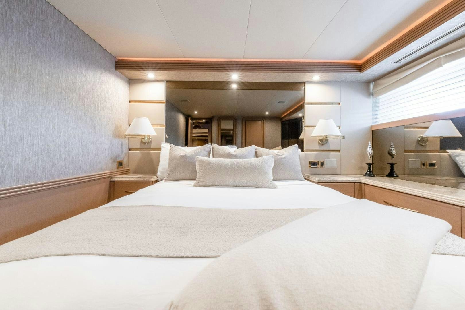 a hotel room with two beds aboard CHECKERED PAST Yacht for Sale